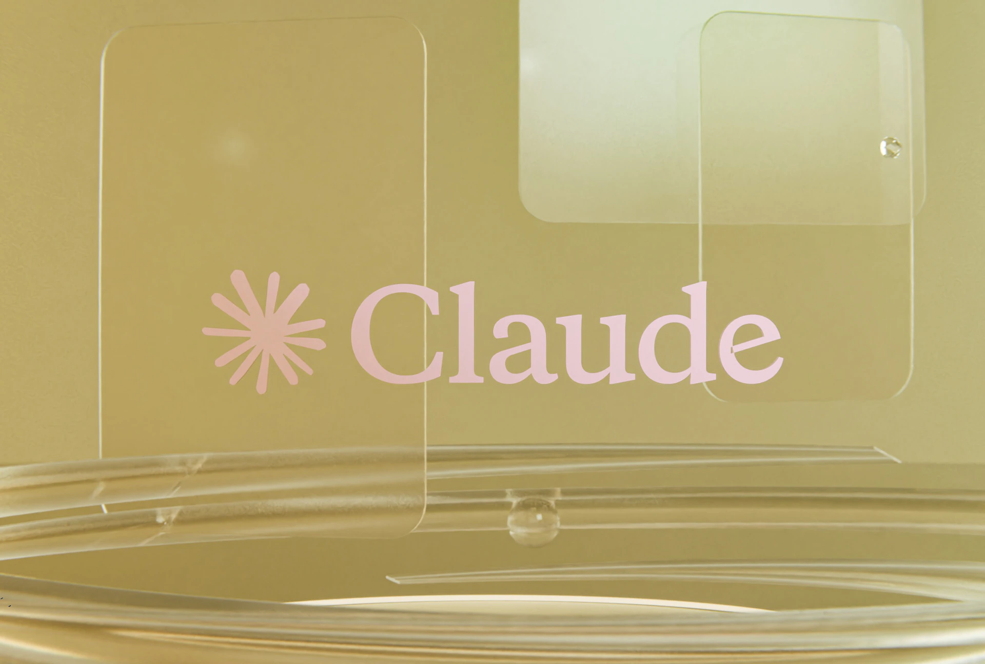Pink claude logo on a golden background with clear elements