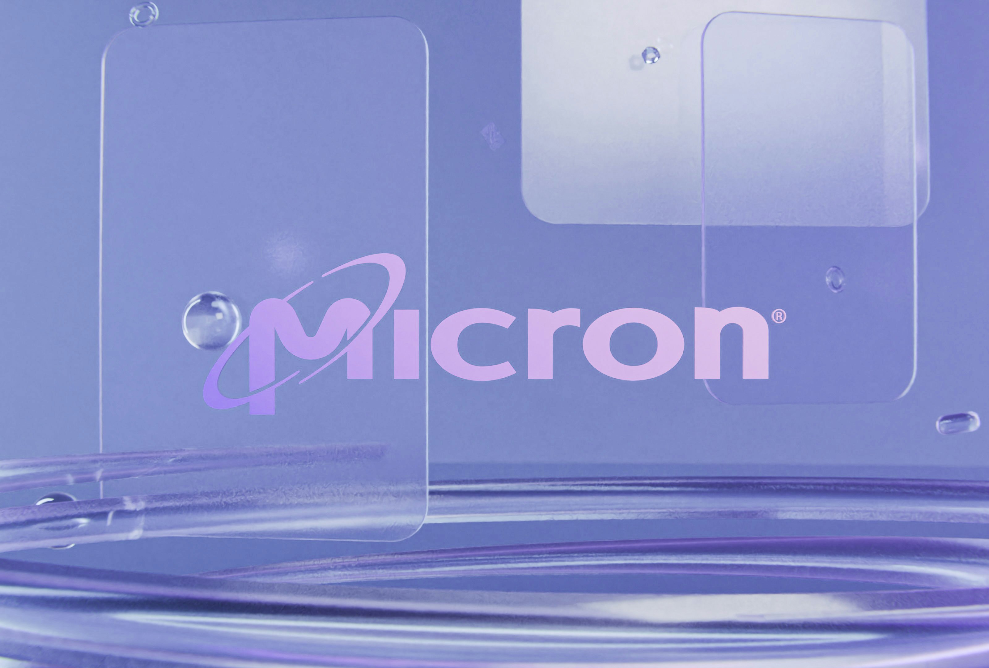 SK하이닉스, 25년 만에 삼성전자 제치고 코스피 시총 1위 등극 - Micron logo on clear panels with water droplets and ripples.