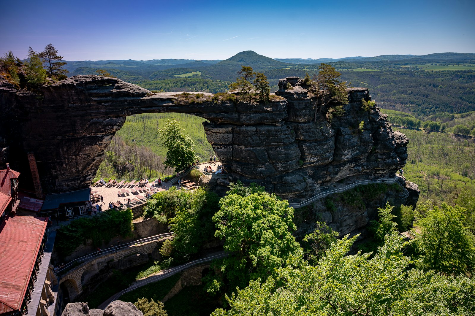 The sandstone arch of Pravčická brána spanning forested cliffs in Bohemian Switzerland