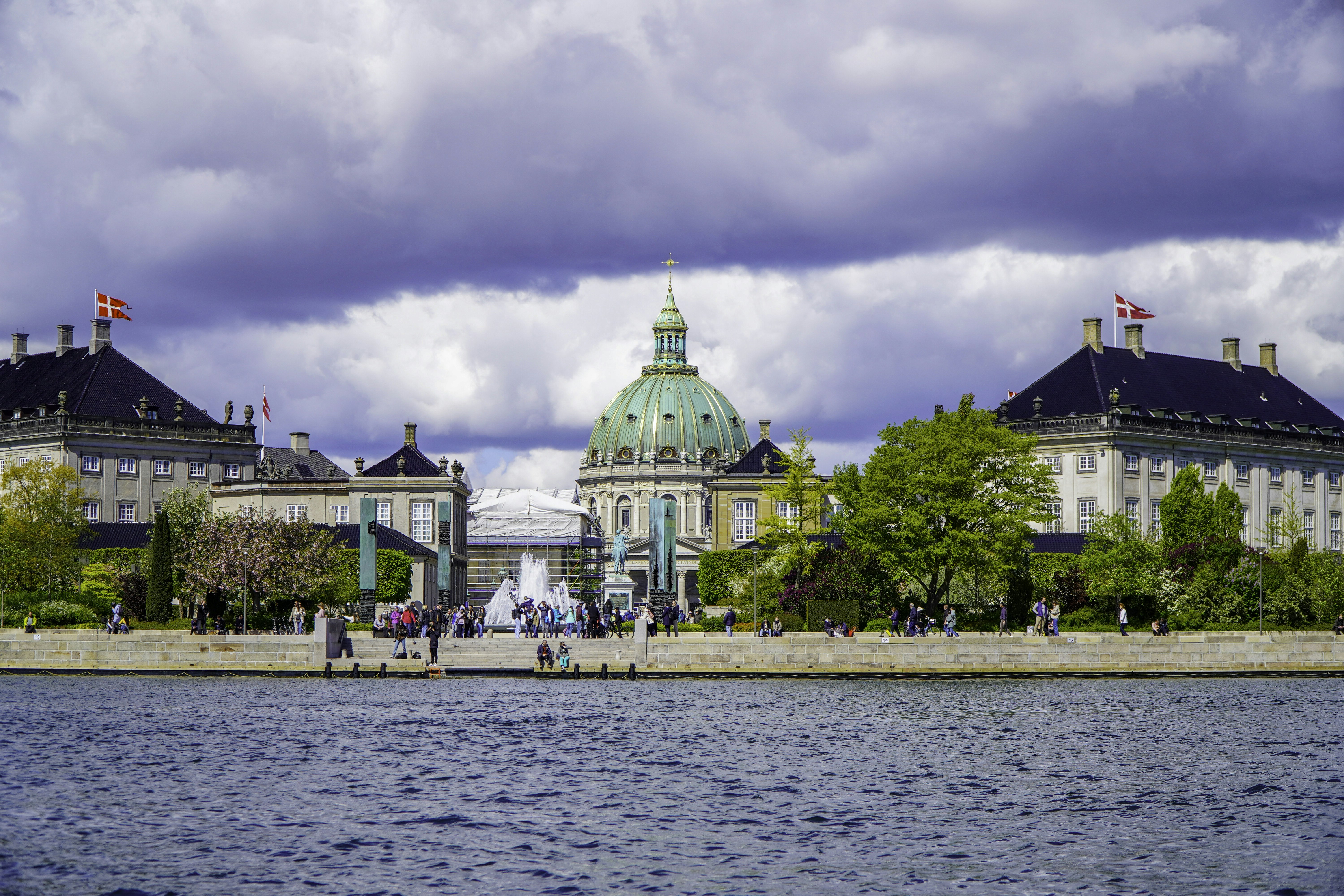 Amalienborg palace and frederik's church in copenhagen from the water.