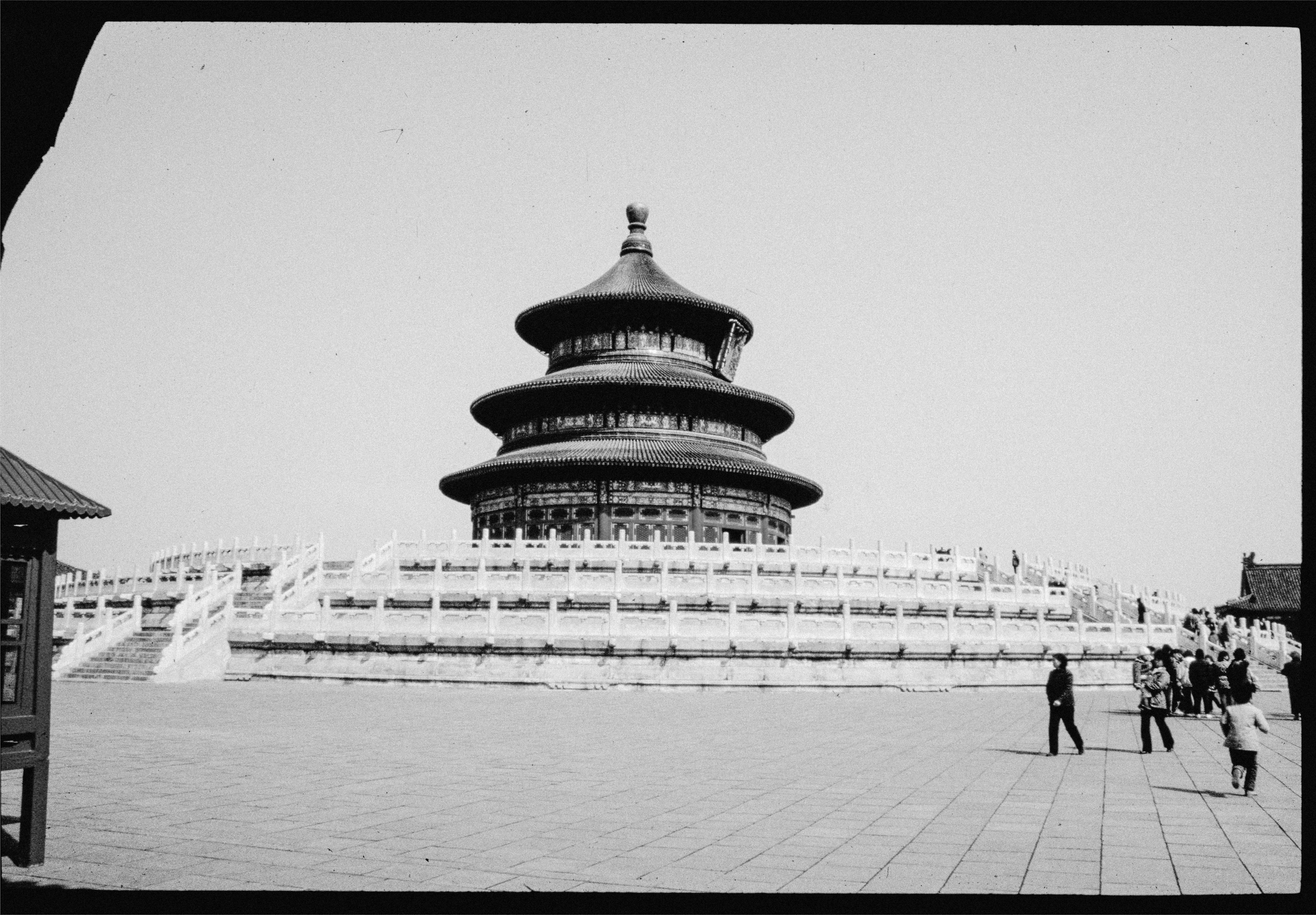 The temple of heaven stands majestically in an open plaza.