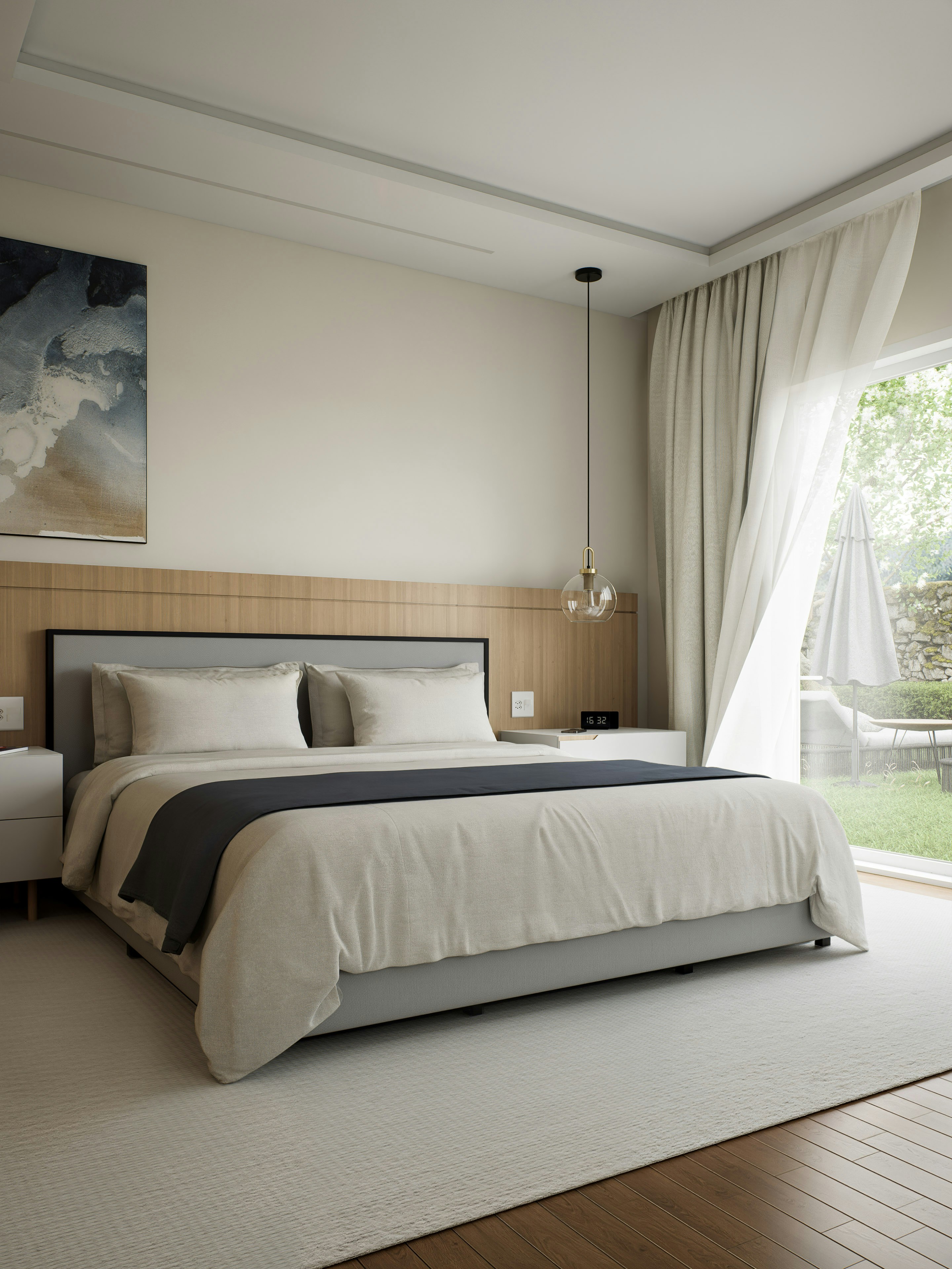 Modern bedroom with a large bed and garden view.