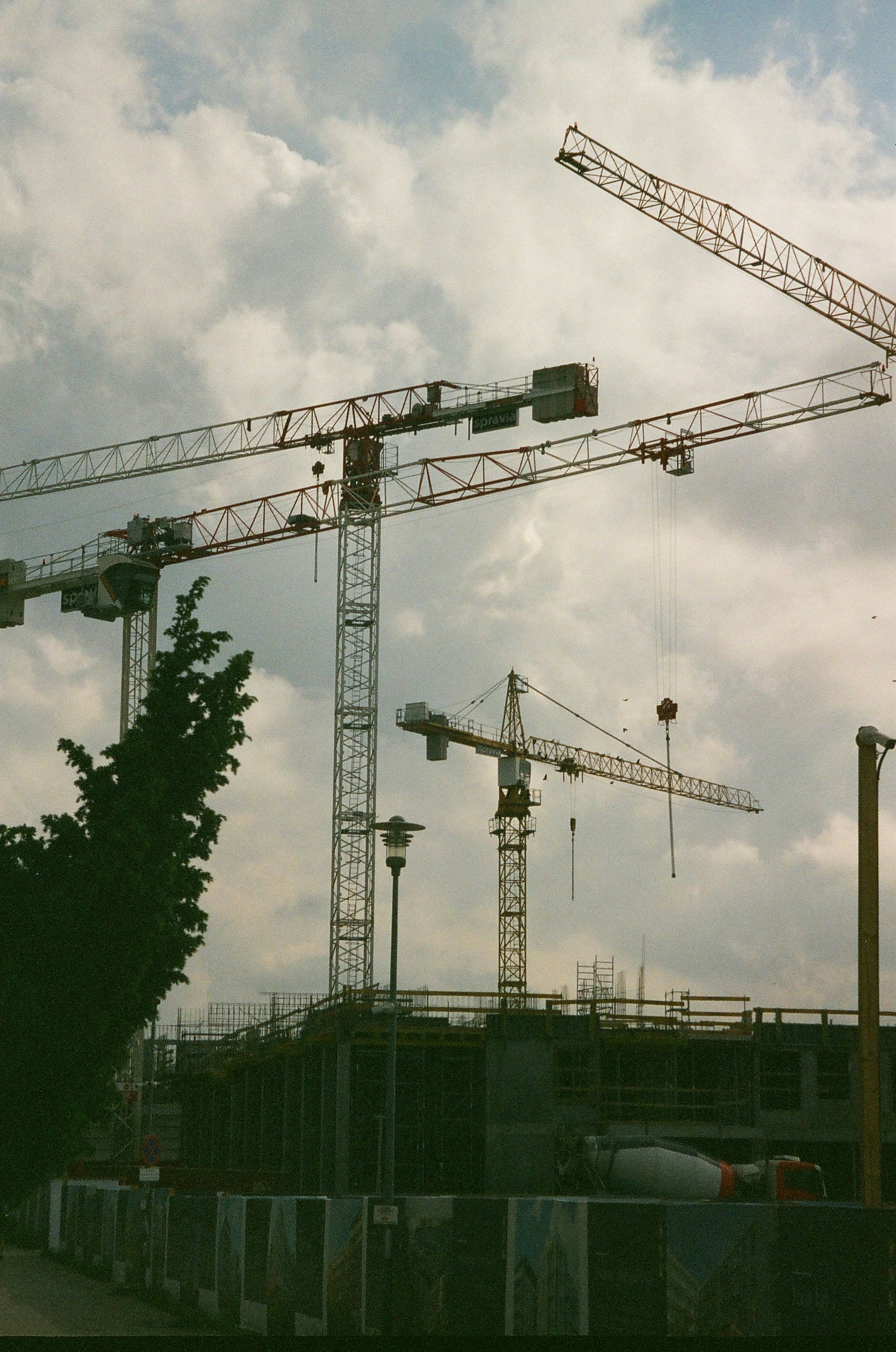 Industrial construction site with cranes