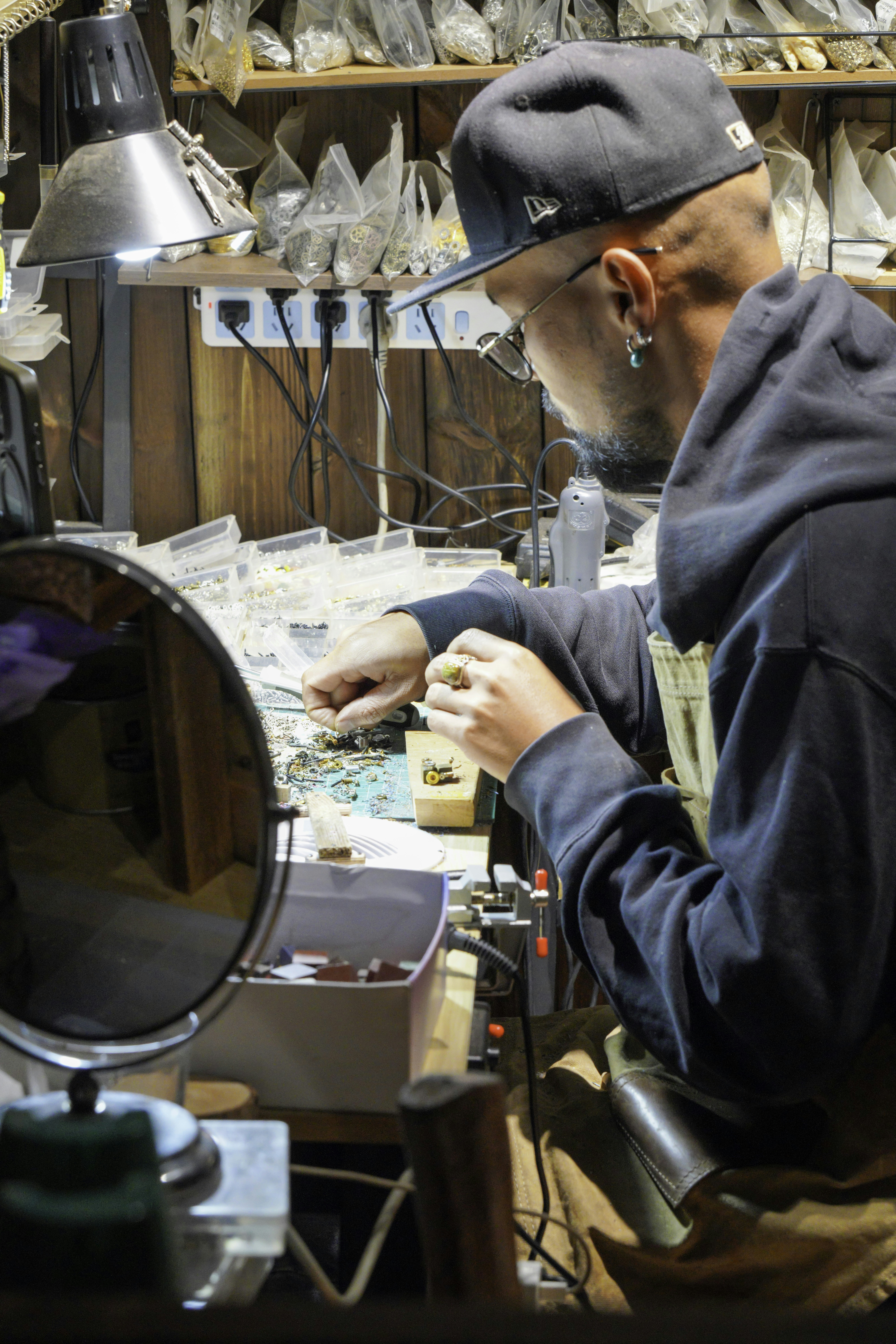 Craftsman engraving lettering into a granite memorial