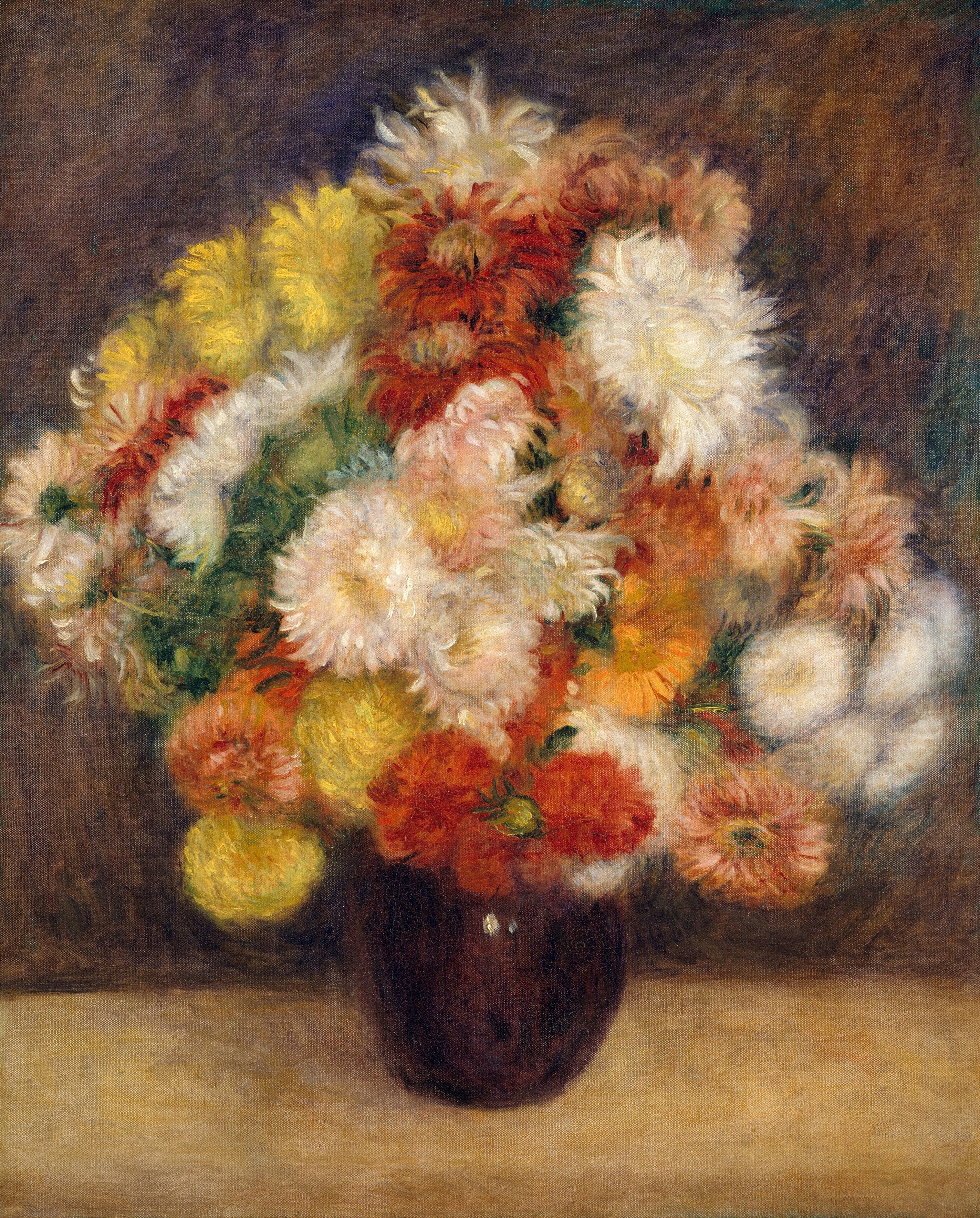 Vibrant bouquet of flowers in a dark vase.