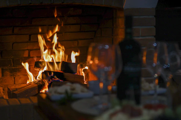 A fireside dinner table
