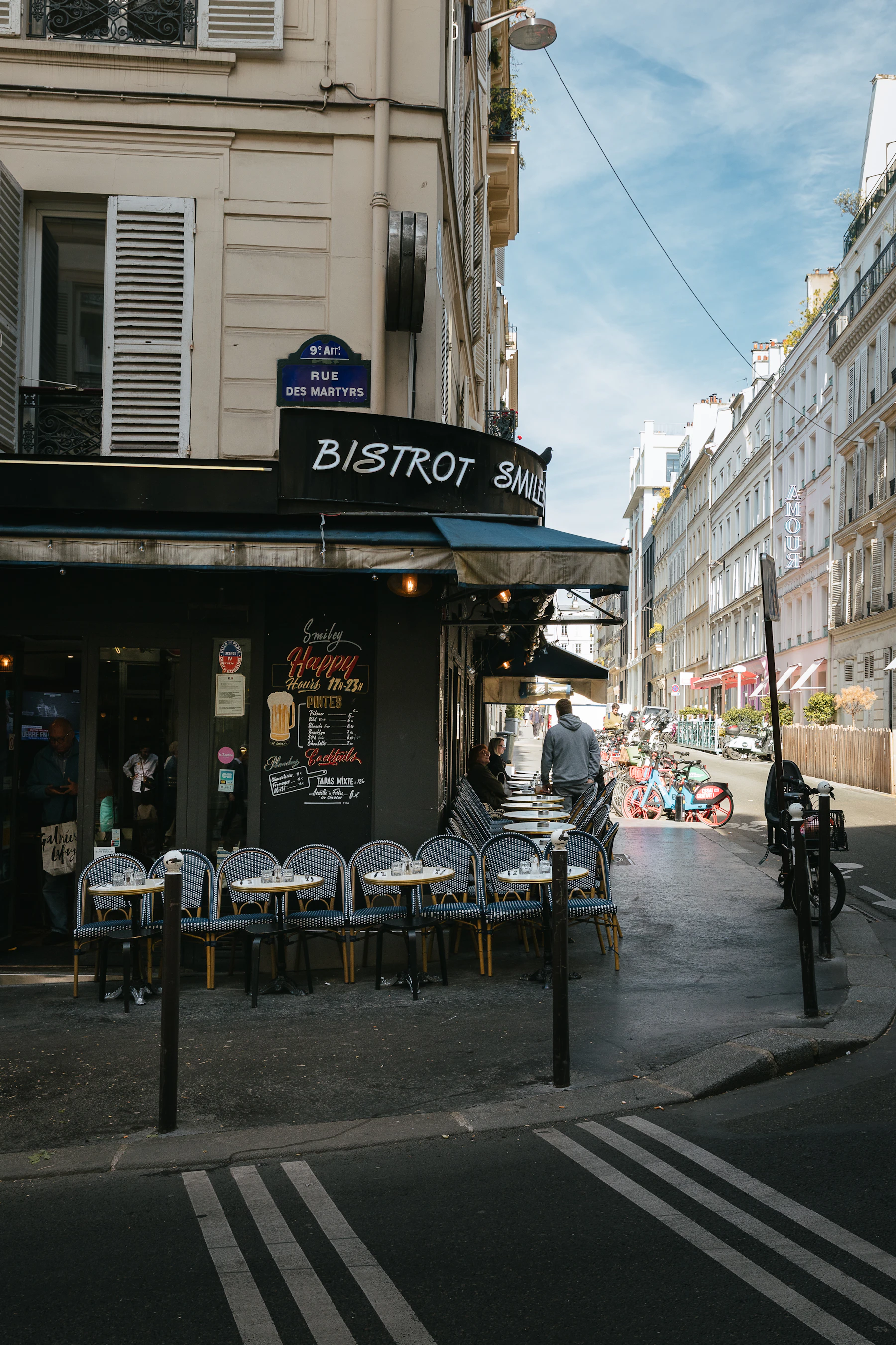 Illustrative travel photograph for this guide: Rue des Martyrs Paris bistro