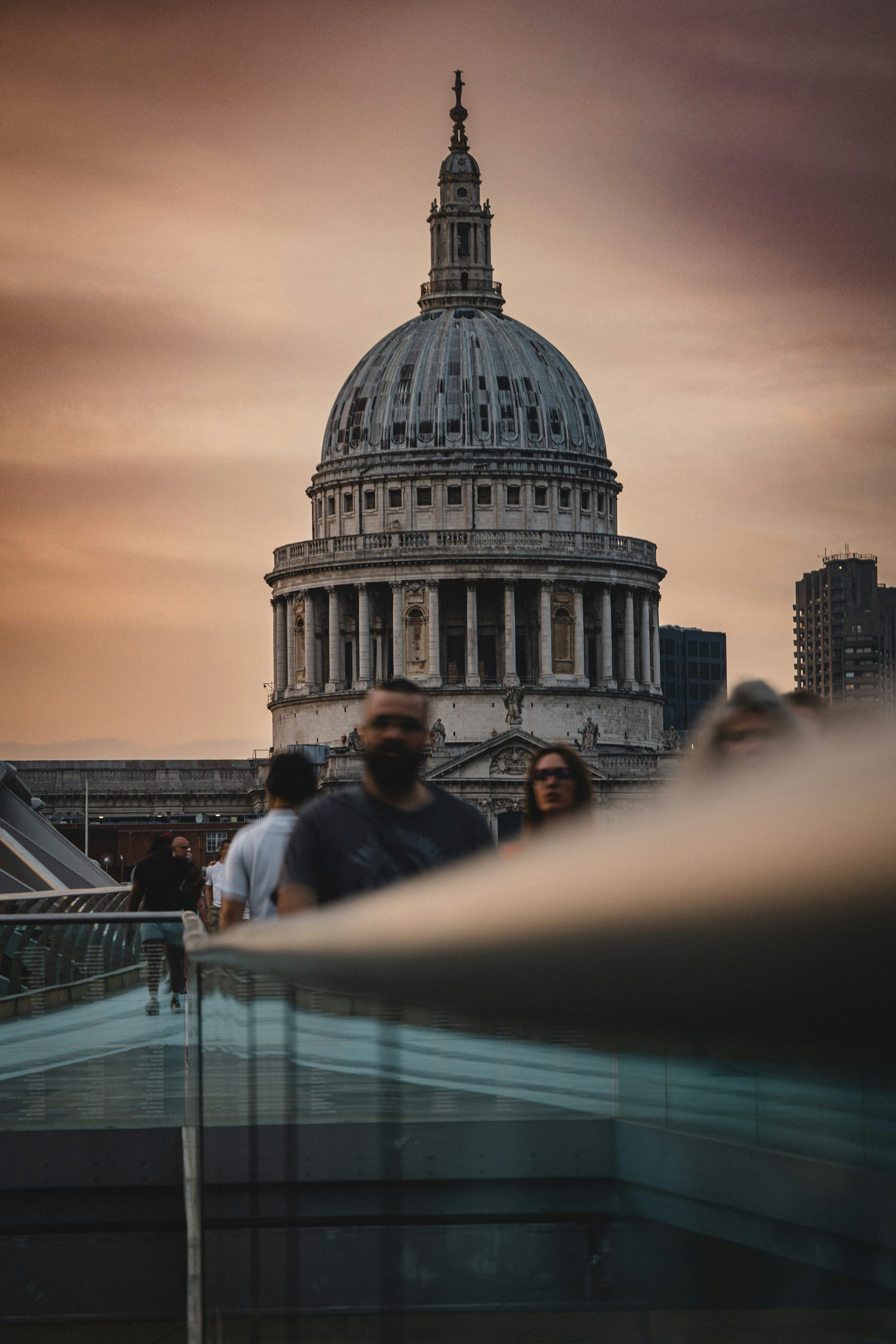 St. paul's cathedral with people on bridge at dusk