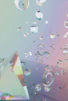 Clear geometric shapes floating on a pastel gradient background.