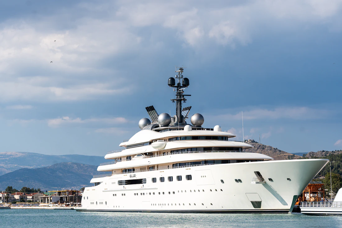 Kestrel, a luxury motor yacht moored in a scenic bay
