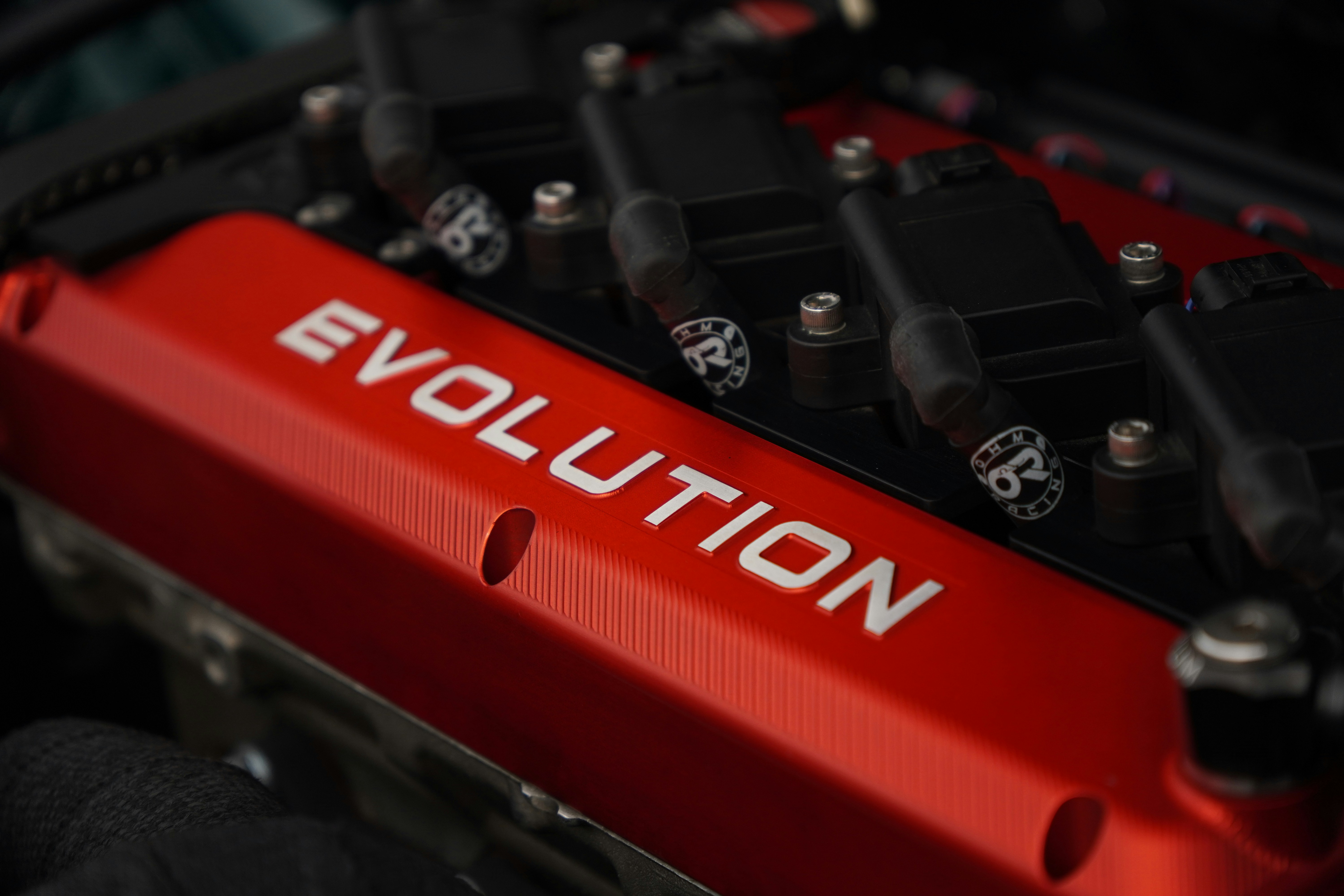 Red car engine cover with