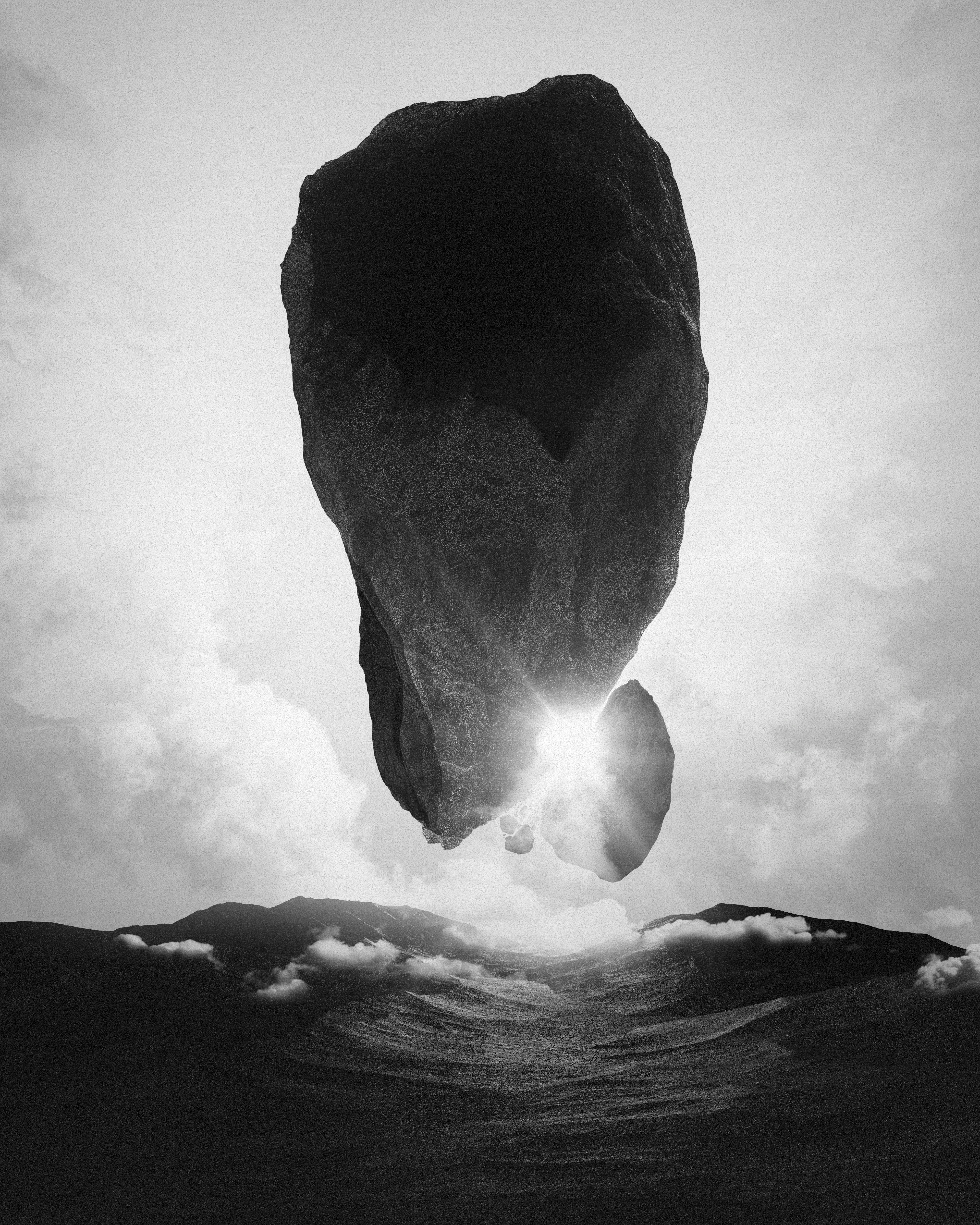 Moving mountain floating above landscape with sunburst