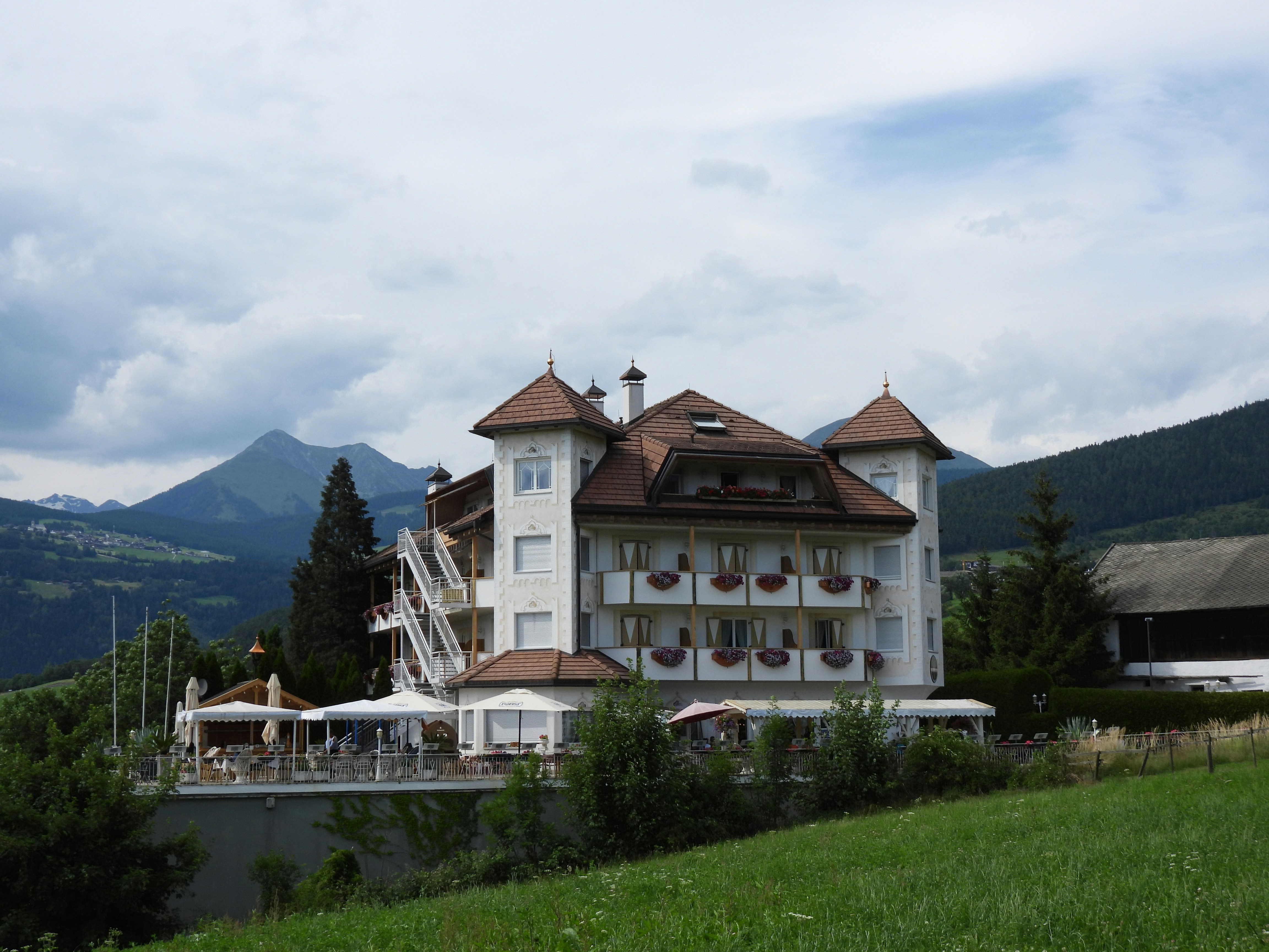 A boutique alpine hotel set against the mountains