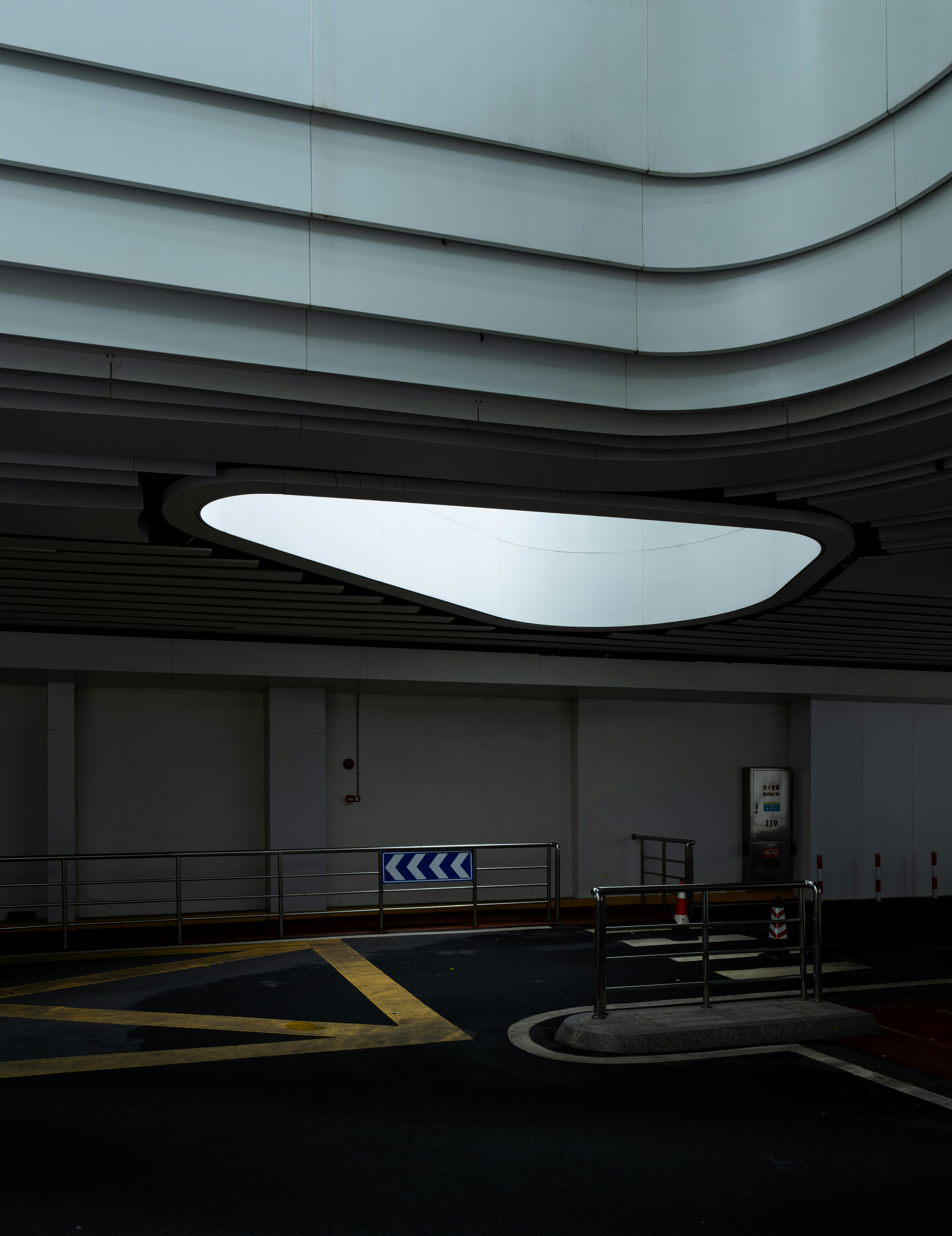 Curved ceiling and oval light in underground passage