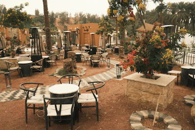 Outdoor terrace restaurant seating with a scenic view, suited to a winery taverna setting