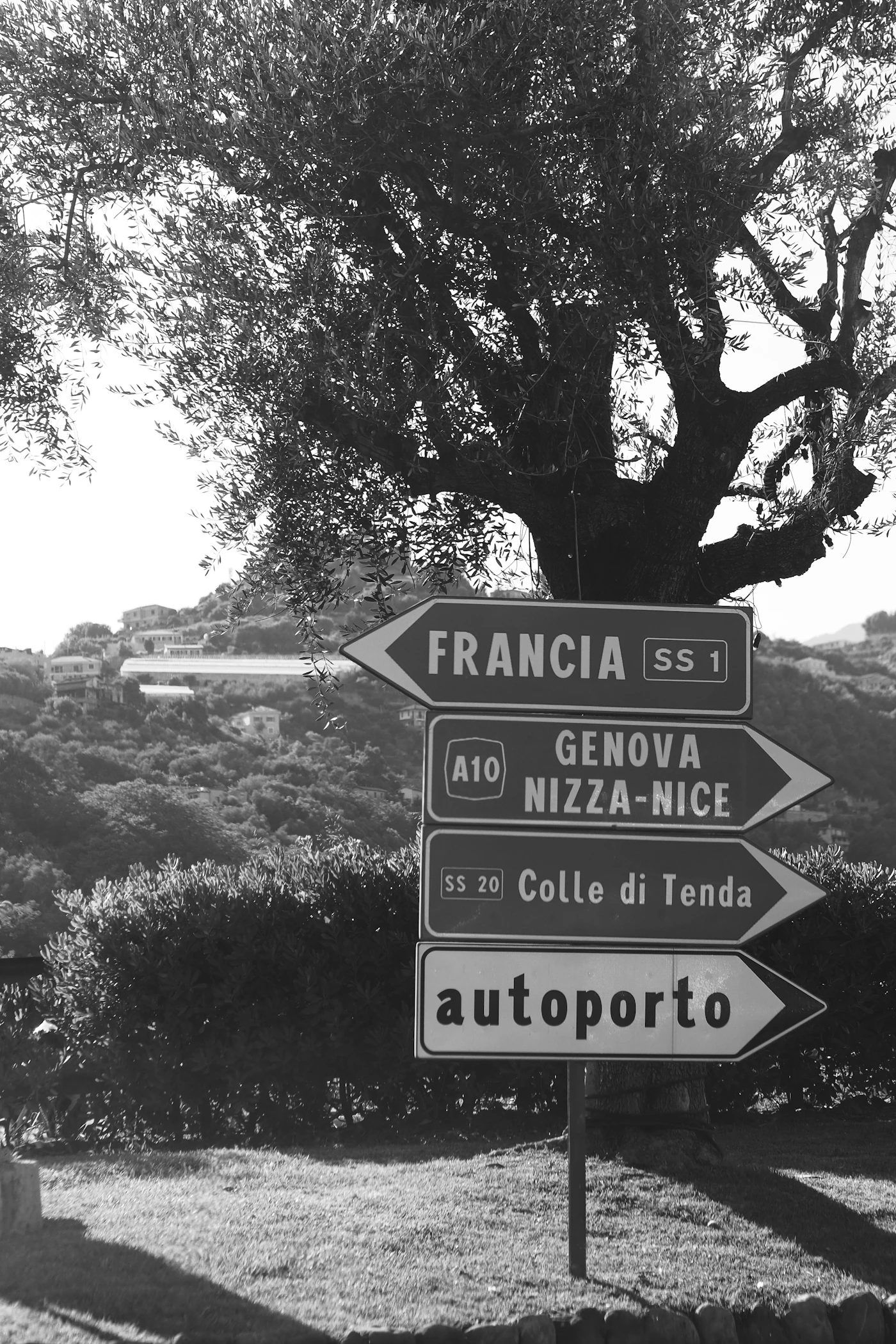 European road signpost pointing toward several destinations