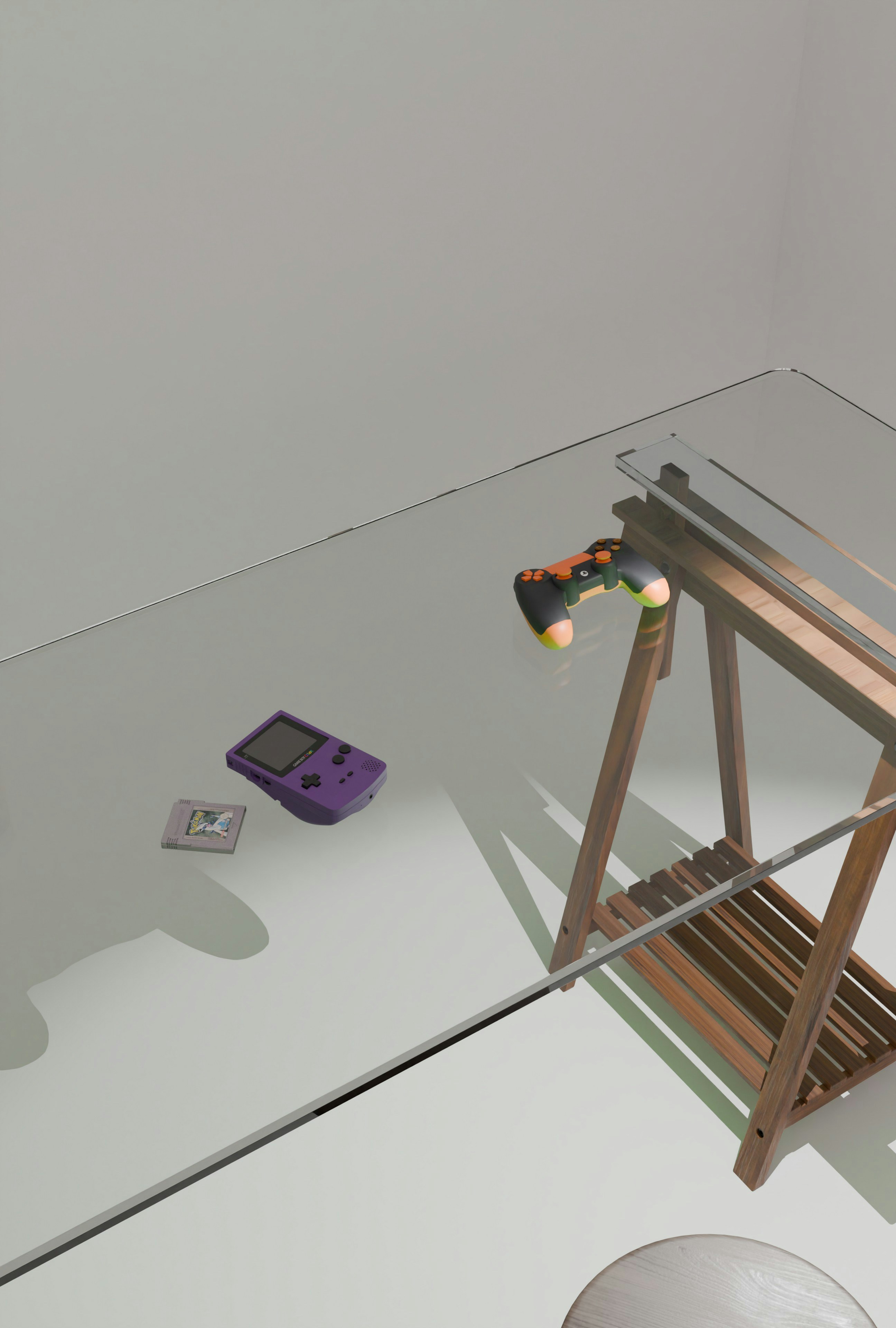 A purple game boy and controller on a table.