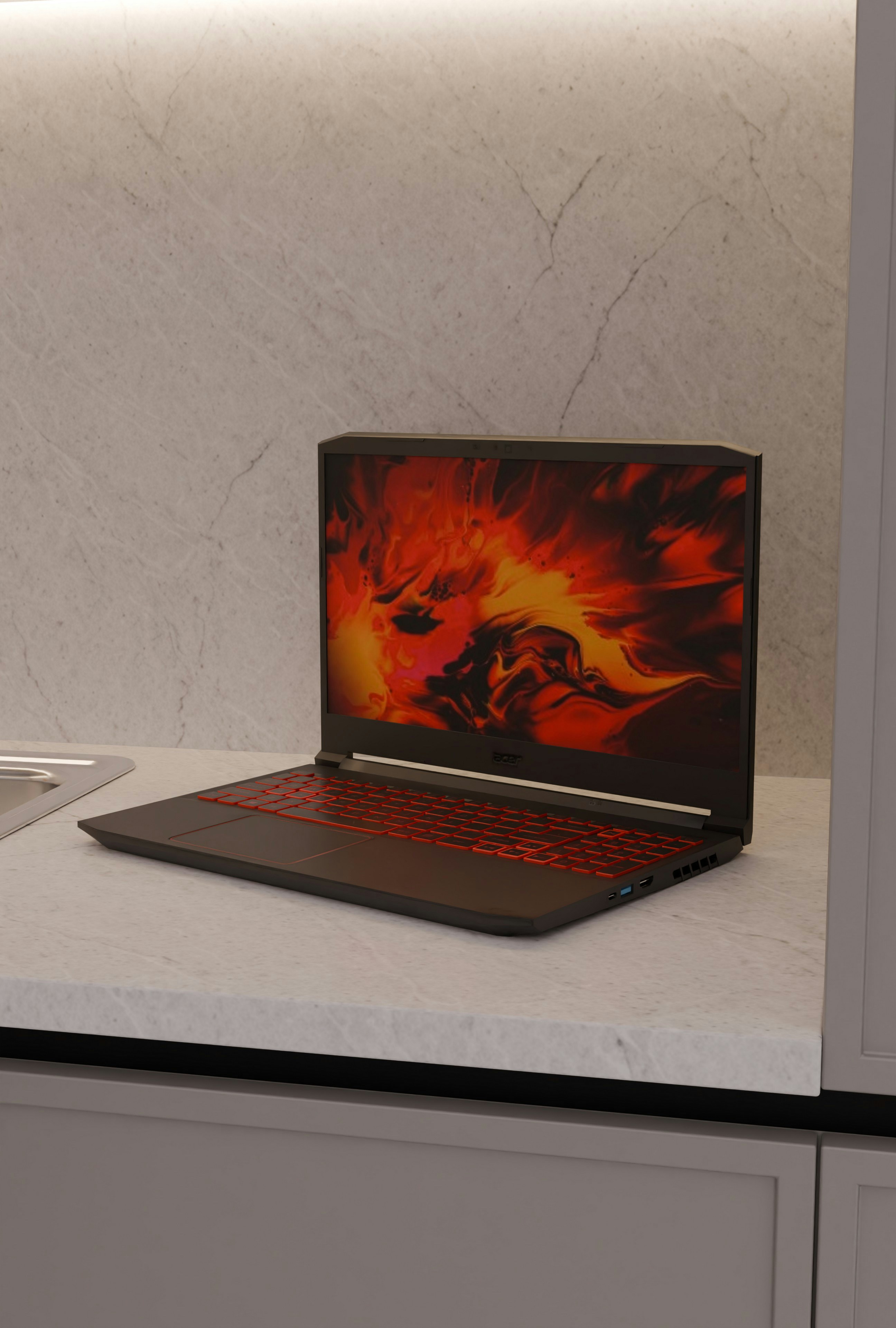 A black laptop with a fiery screen on a countertop. photo – Free Laptop ...