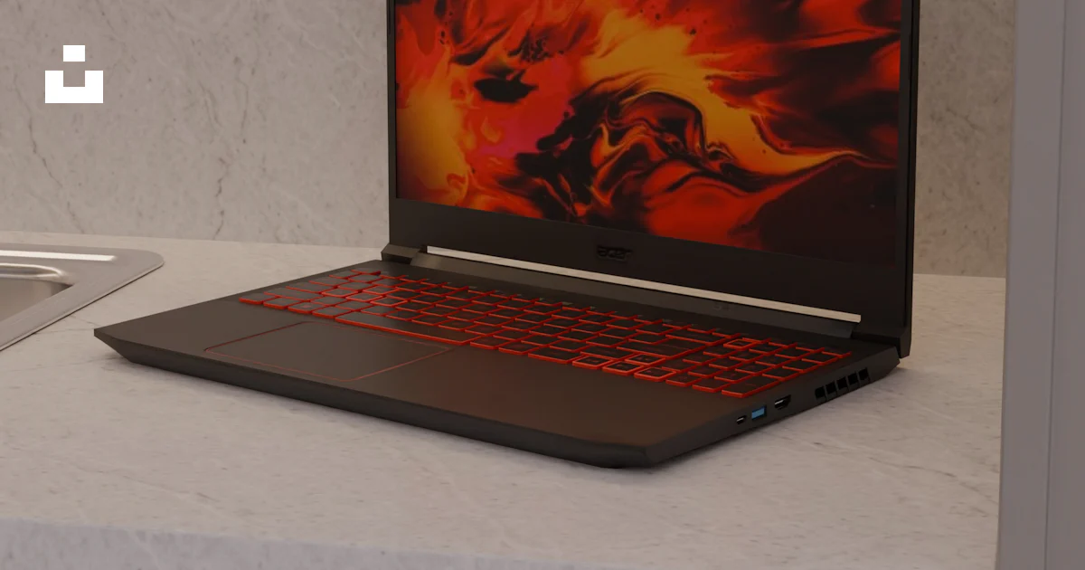 A black laptop with a fiery screen on a countertop. photo – Free Laptop ...