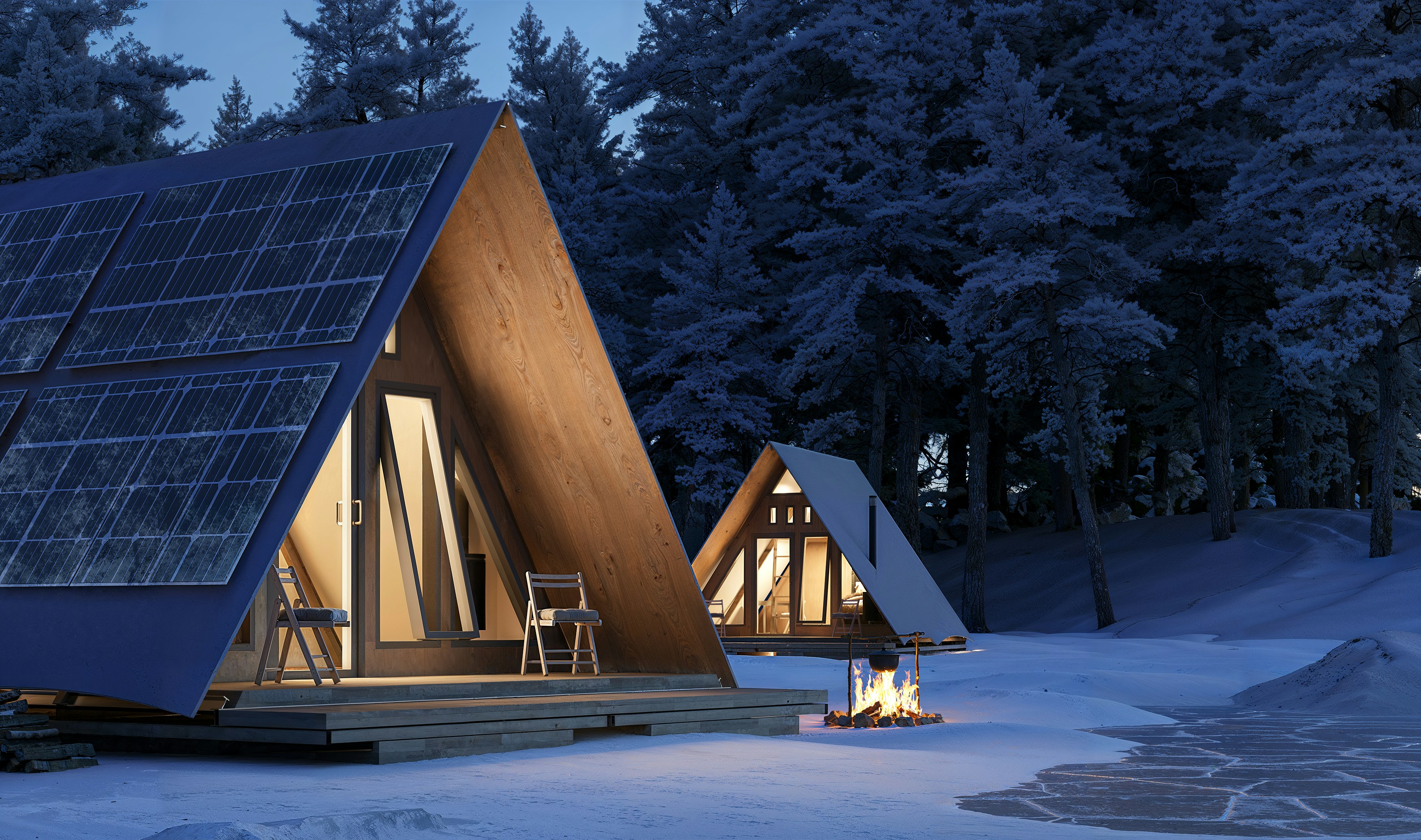 Illuminated a-frame cabins with solar panels in snowy forest.
