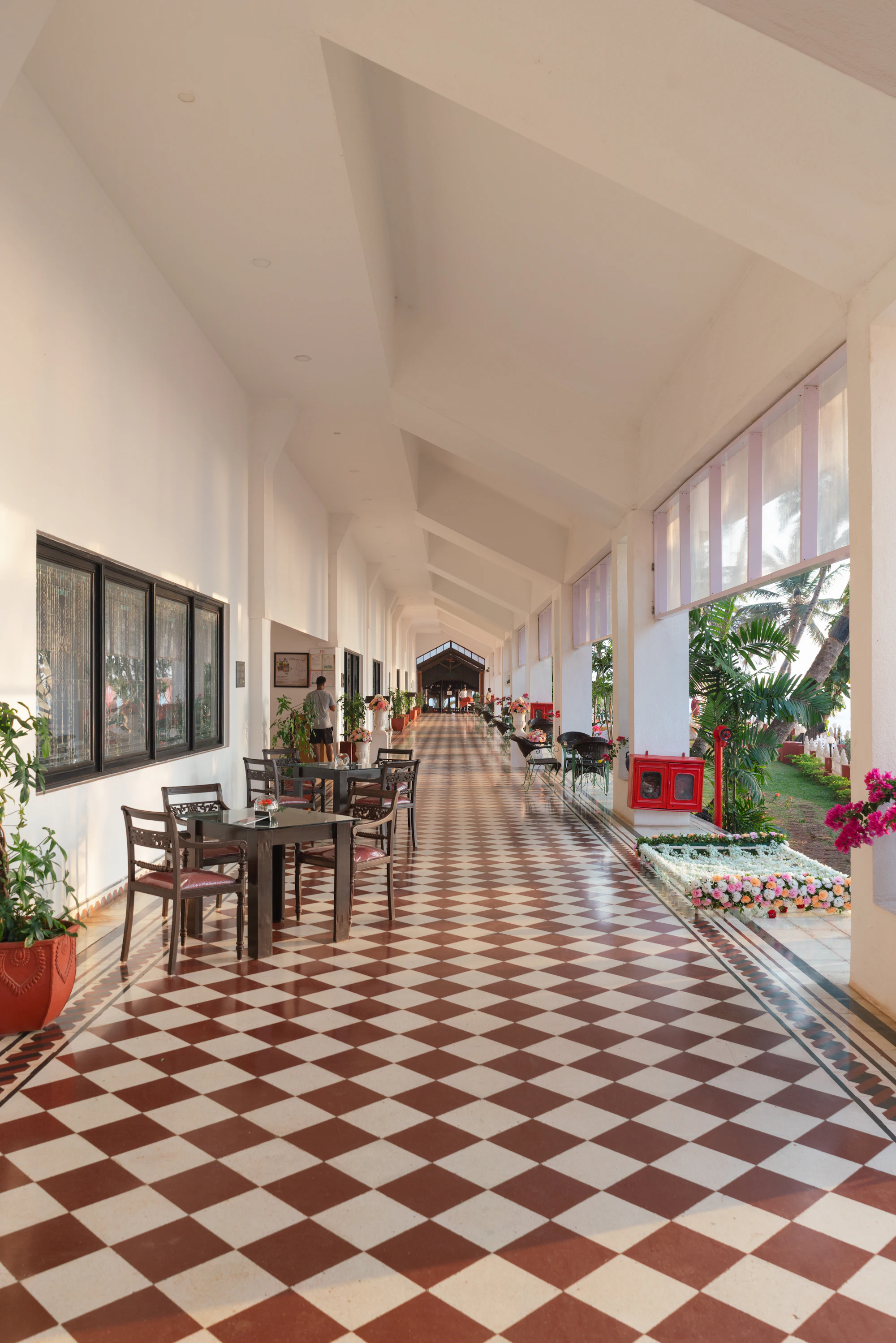 Colonnaded corridor with tiled floor