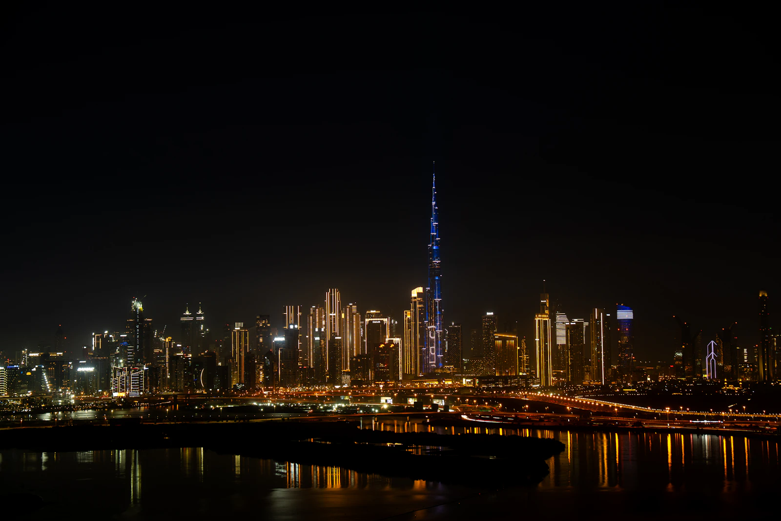 Downtown Dubai skyline lit up at night