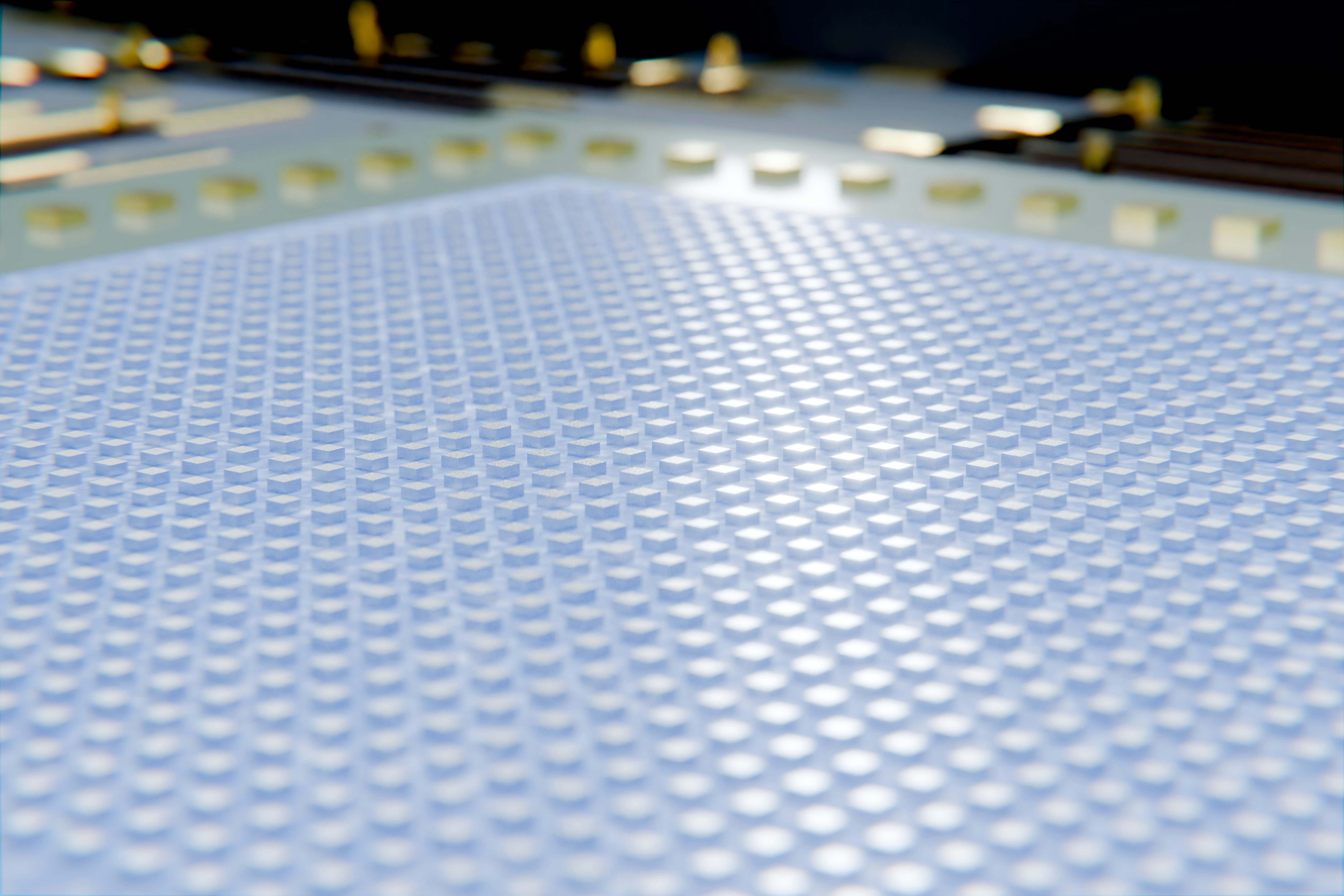 robotic industrial microscope inspecting silicon wafer circuitry