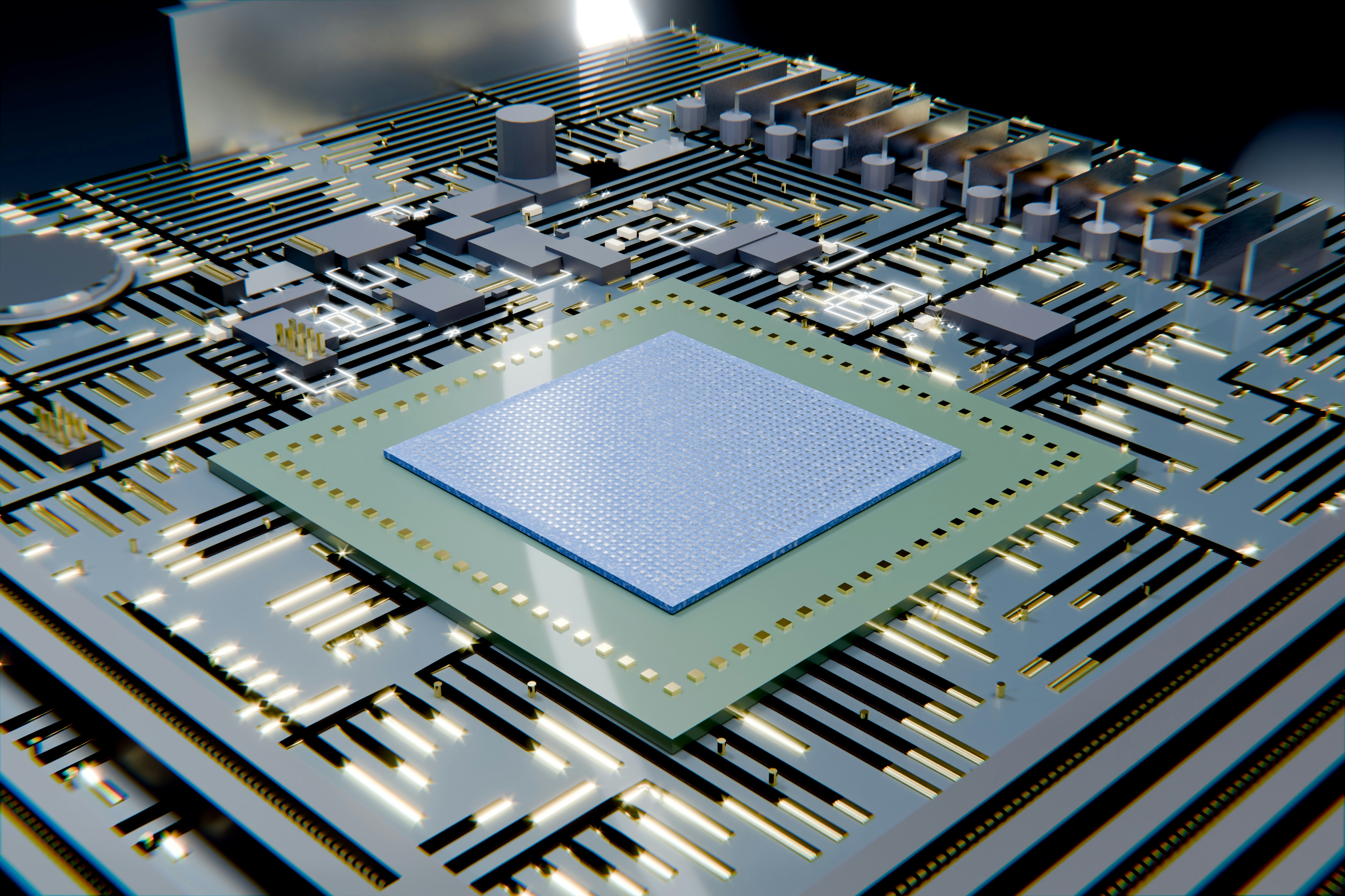 A square microchip on a complex metallic circuit board.