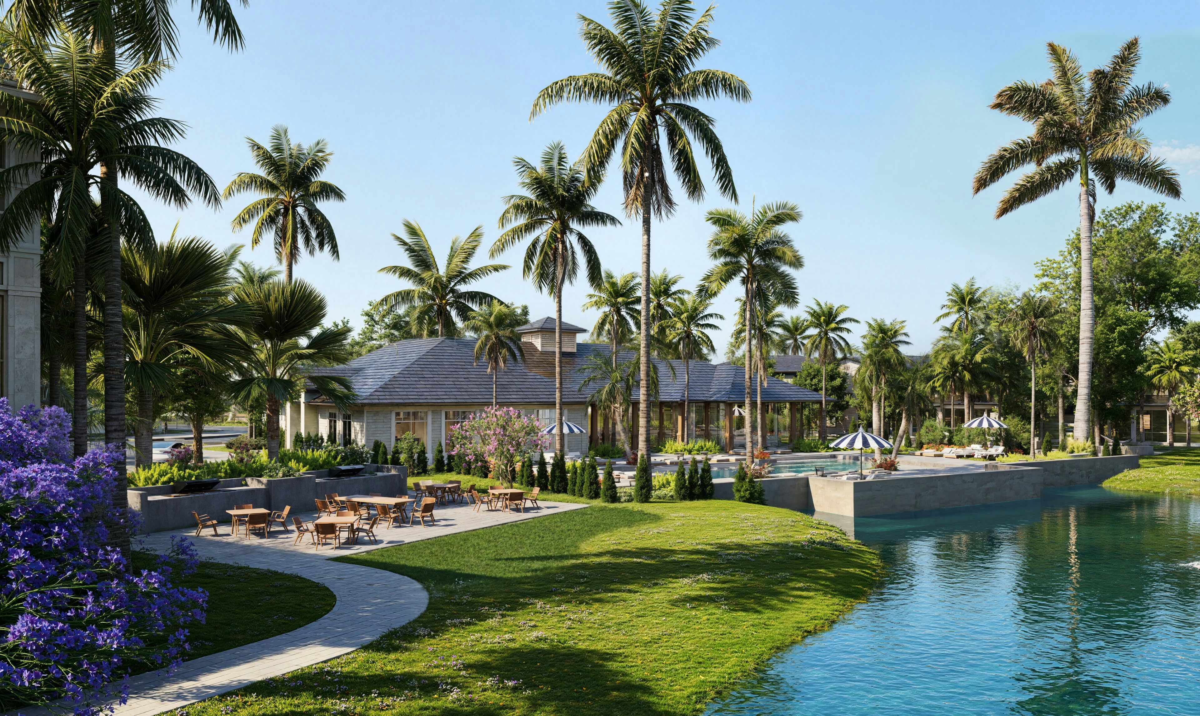 Tropical resort with palm trees, lake, and outdoor seating