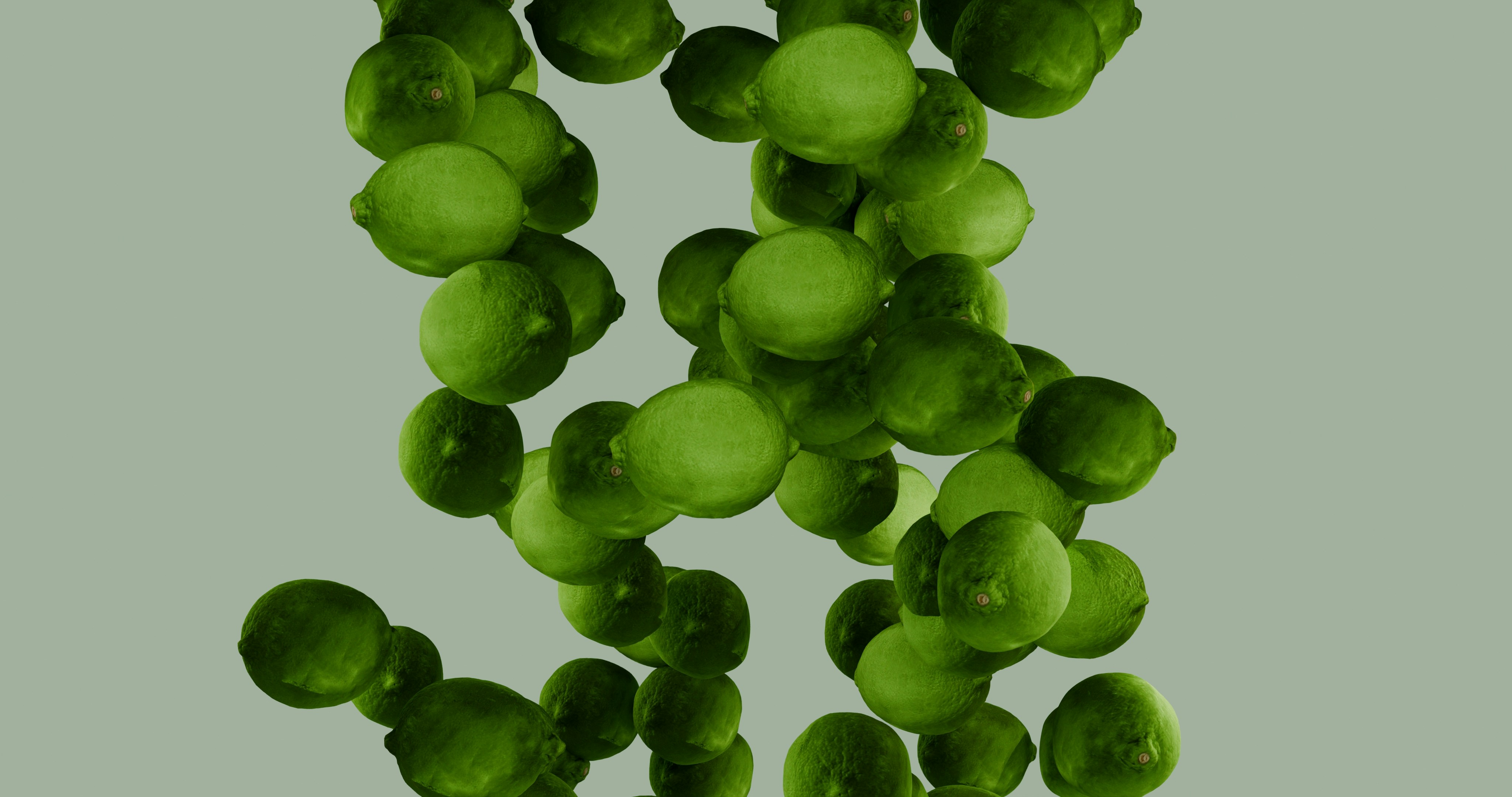 Falling green limes against a muted background.