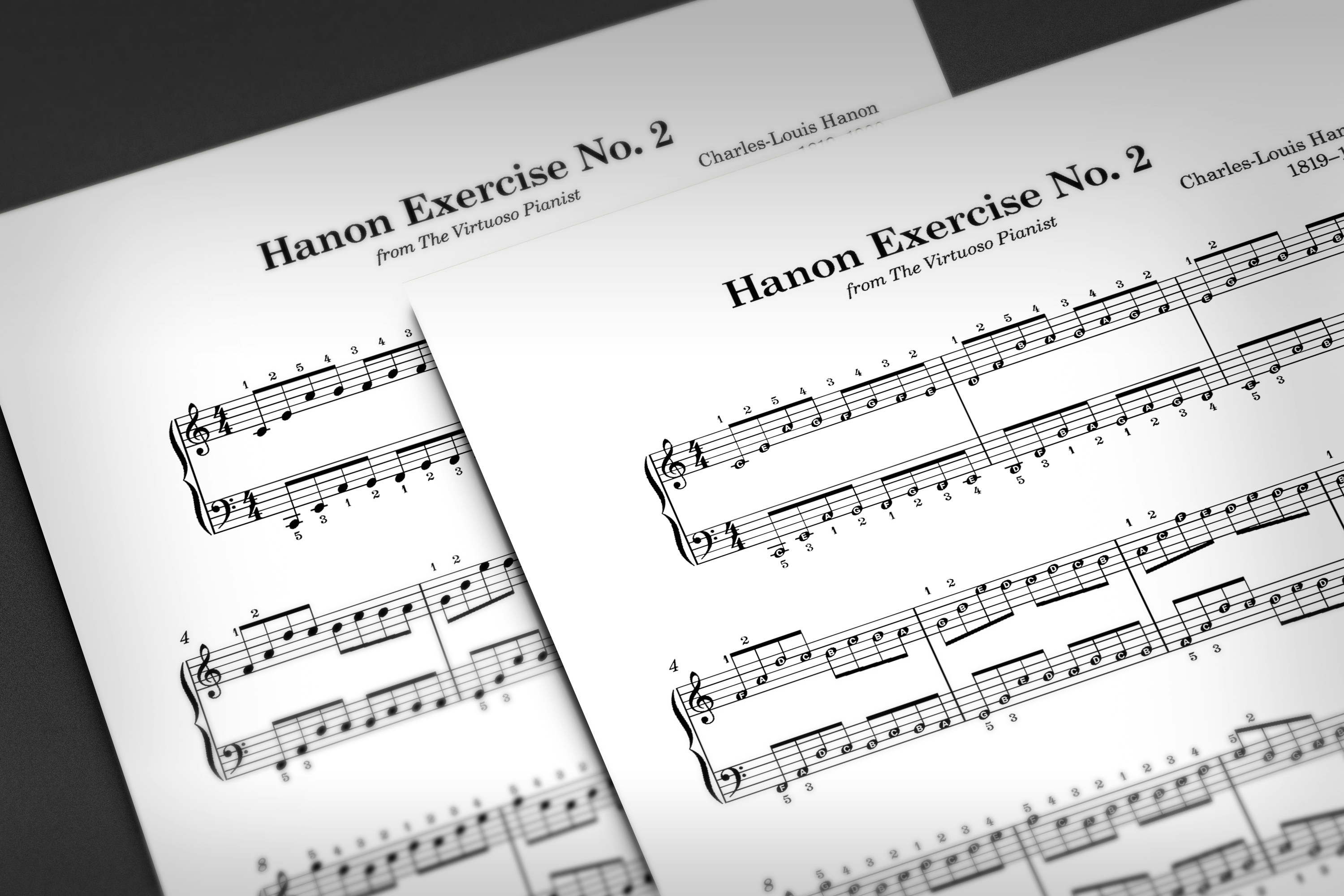 Two sheets of hanon piano exercise sheet music.