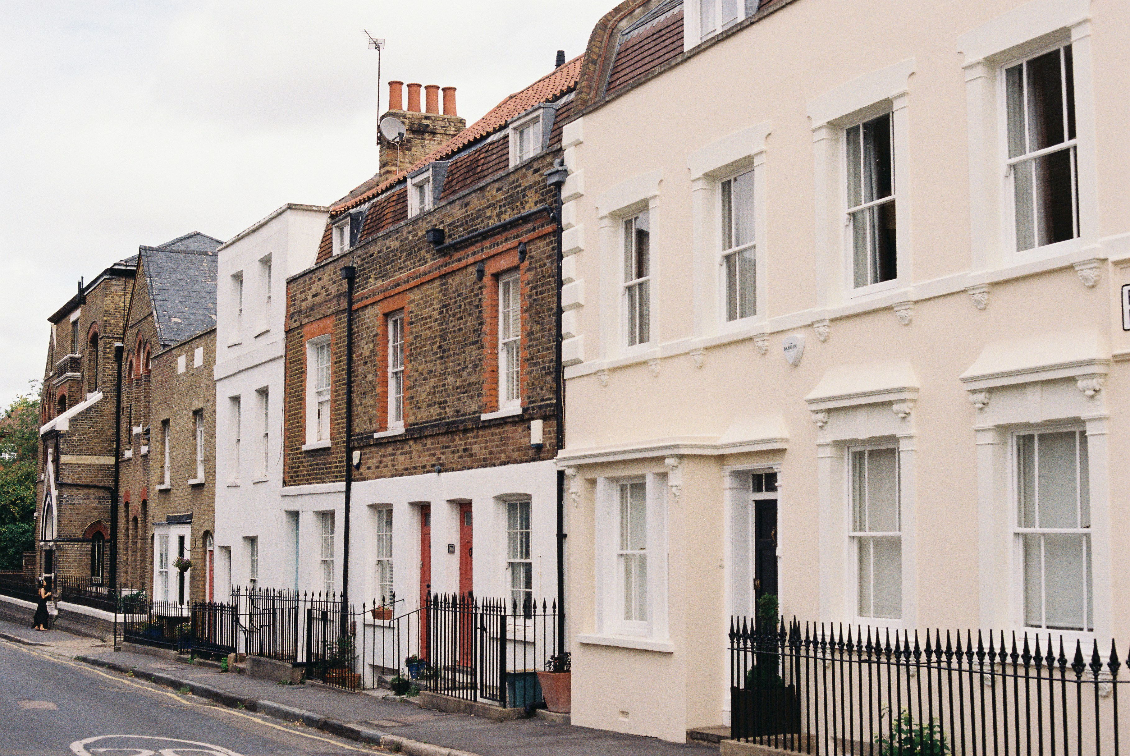 Traditional terraced rental properties on a UK residential street