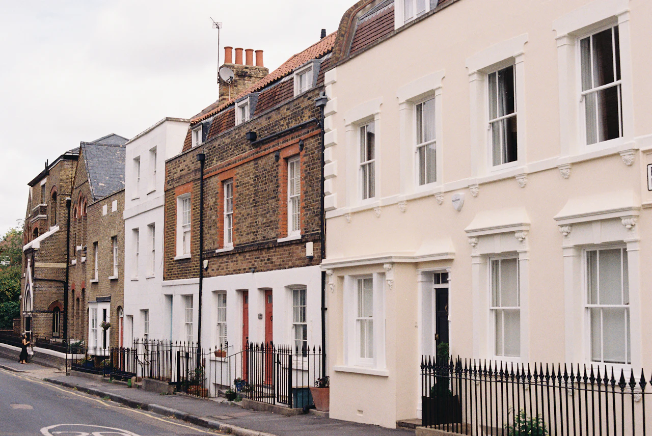 Traditional terraced rental properties on a UK residential street