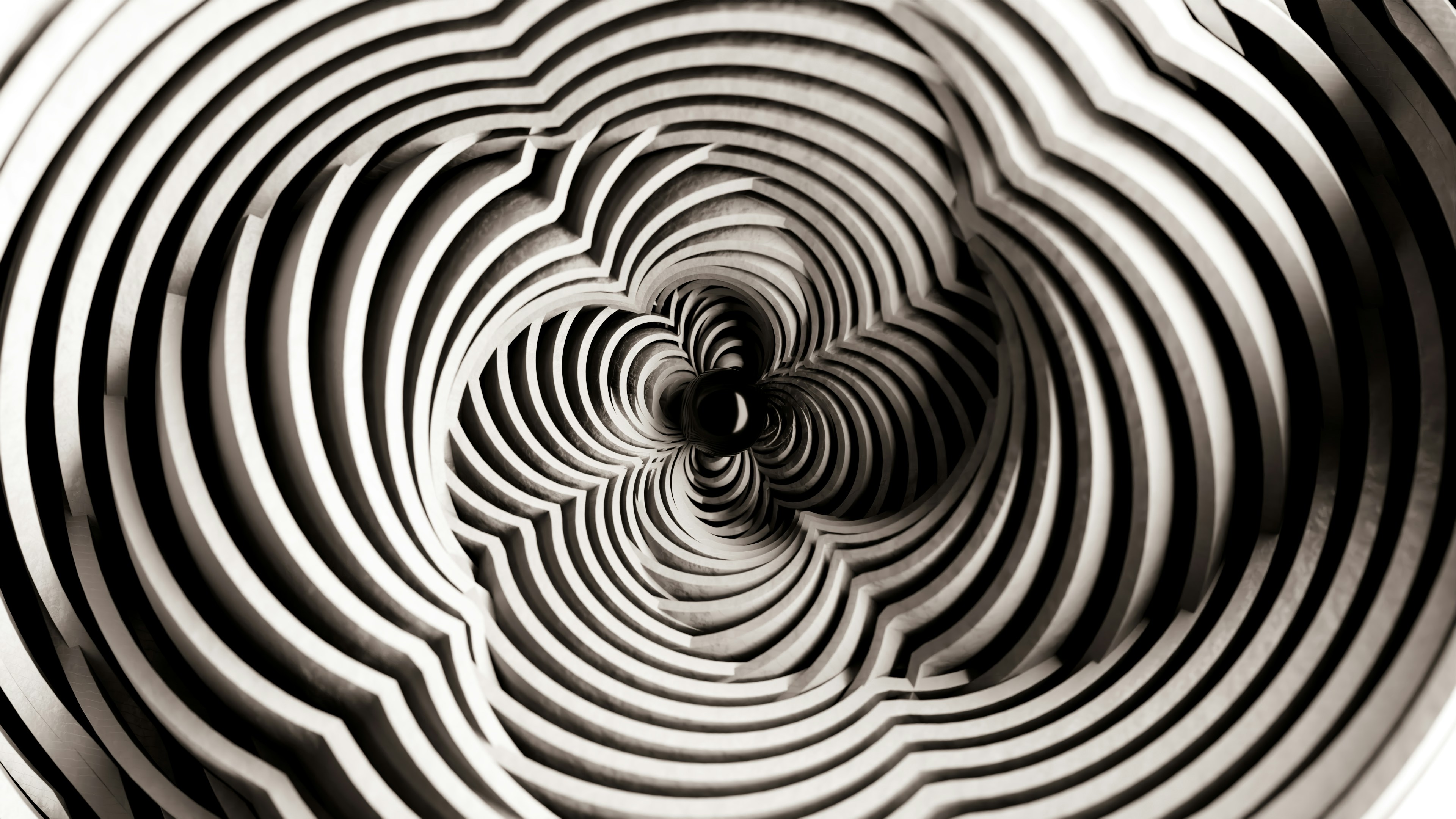 Des lignes abstraites en noir et blanc tourbillonnantes créent un motif hypnotique.
