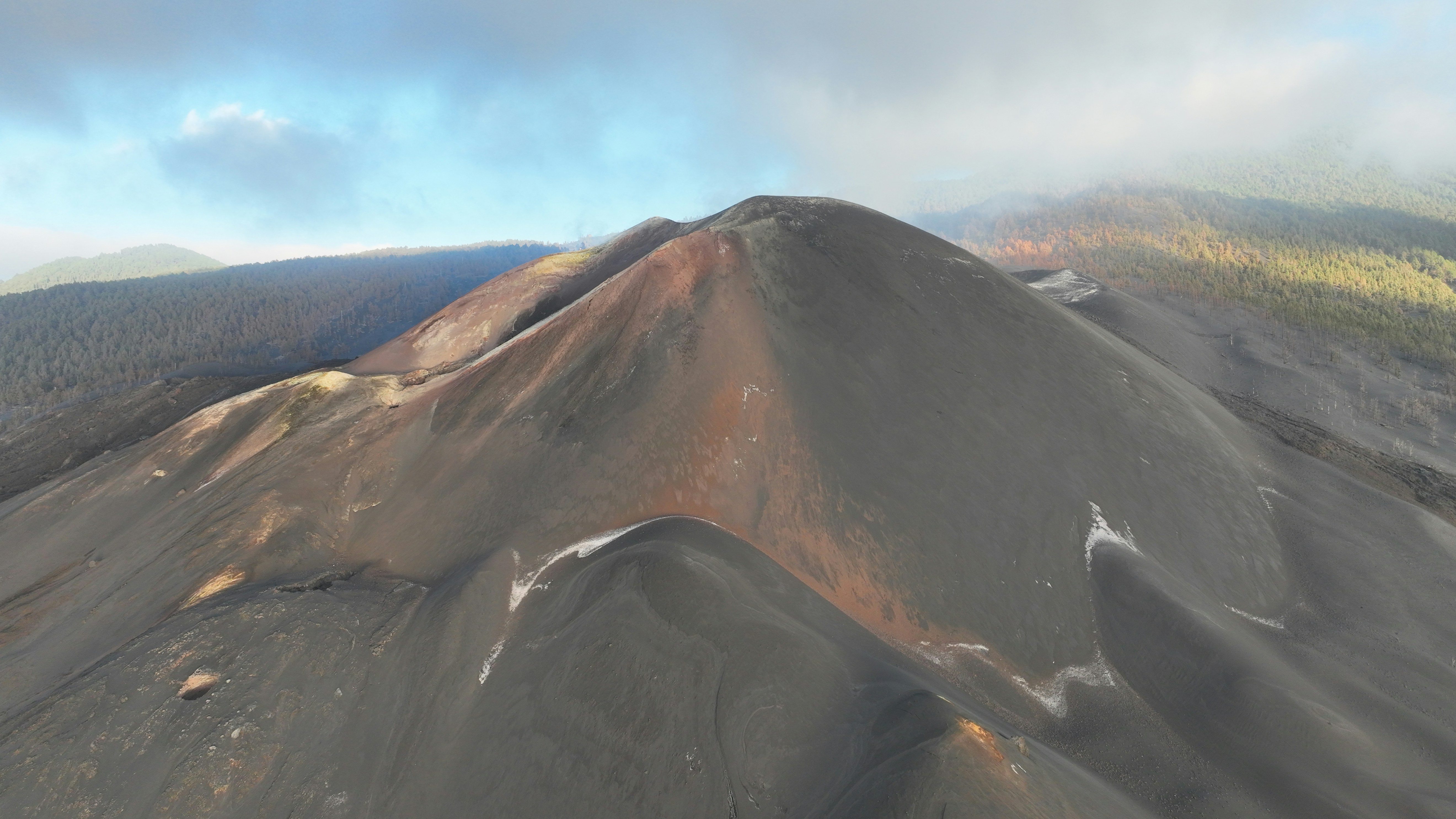 Volcanic peak on la palma under a cloudy sky