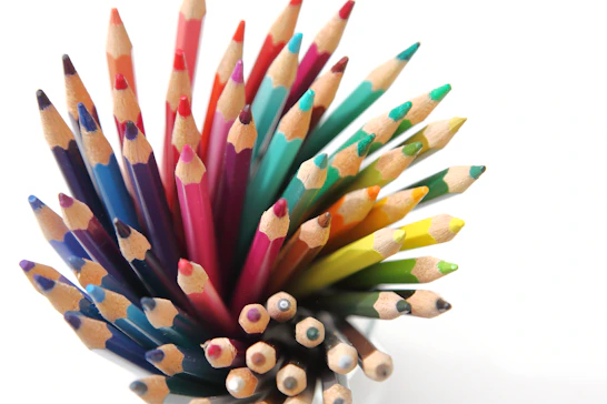 A vibrant collection of colorful pencils against a white background