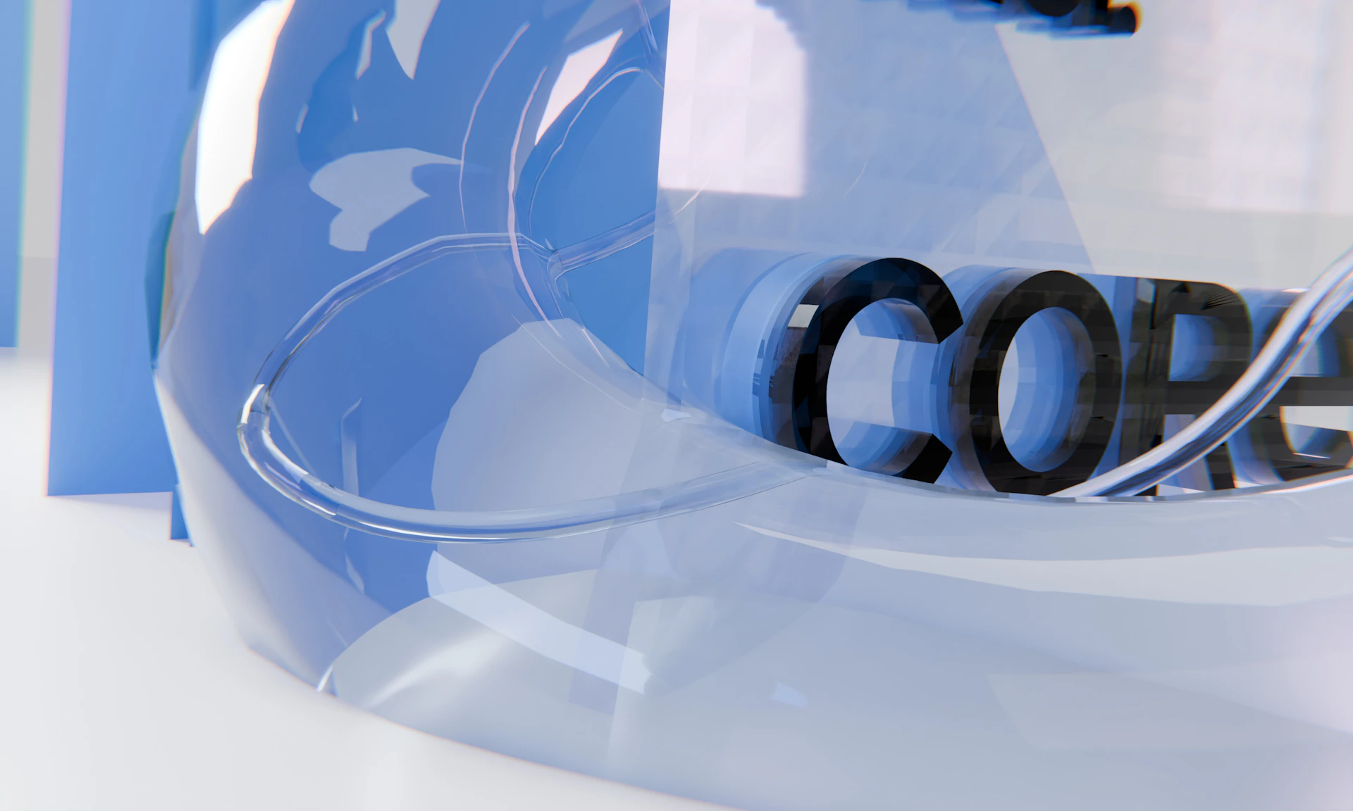 Abstract blue glass shape with "core" text.
