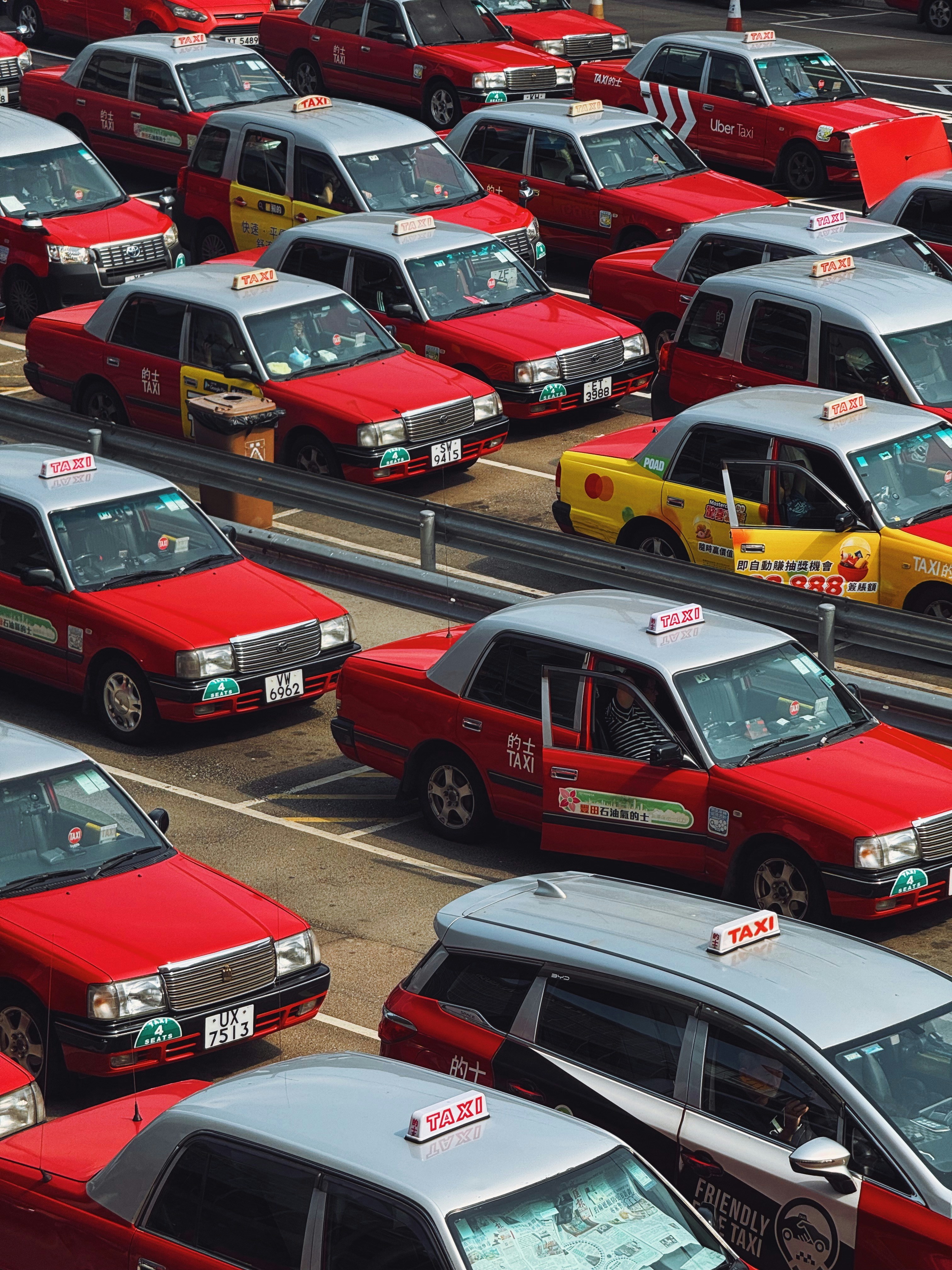 Rows of red and yellow hong kong taxis