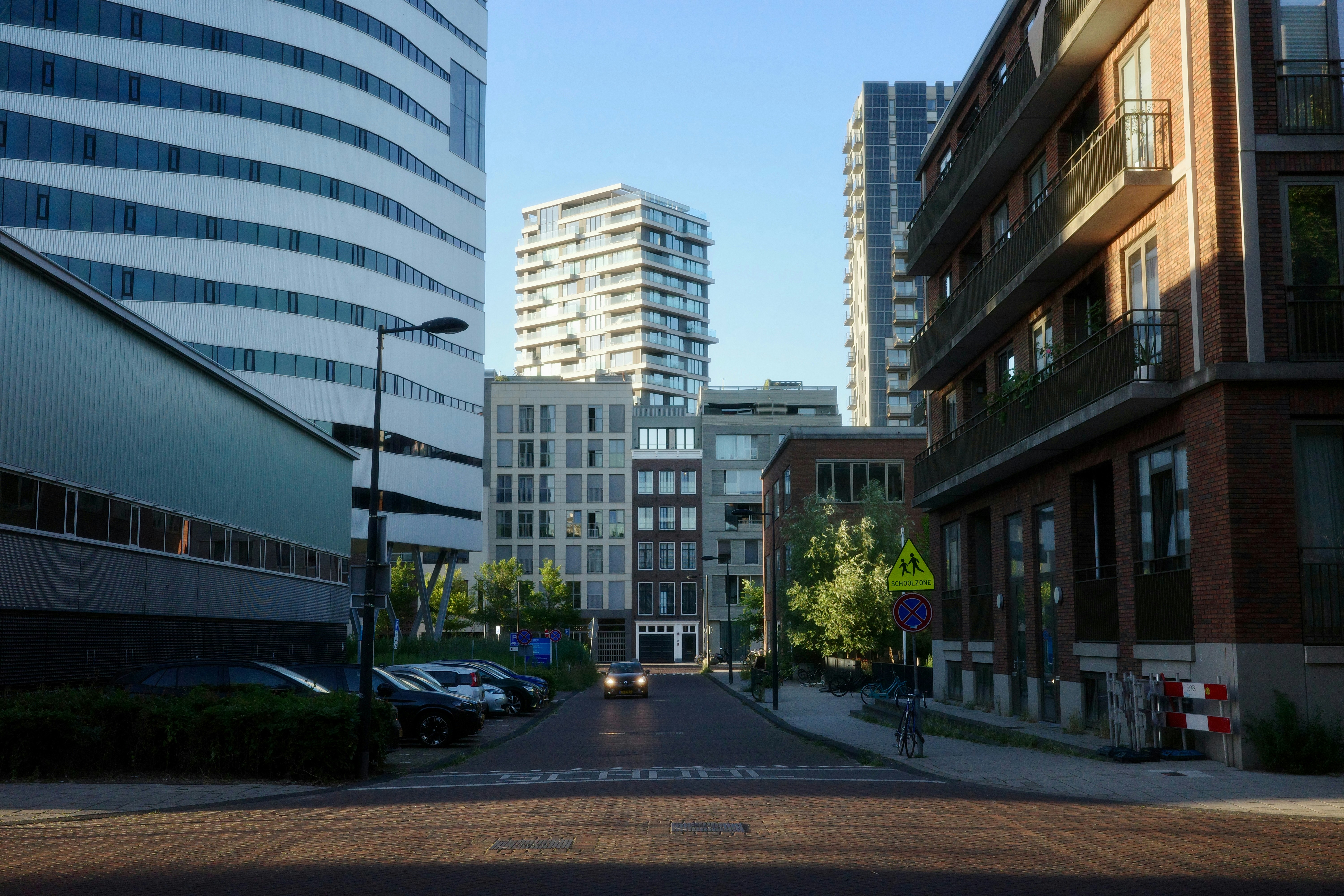 Urban street scene with modern and traditional buildings