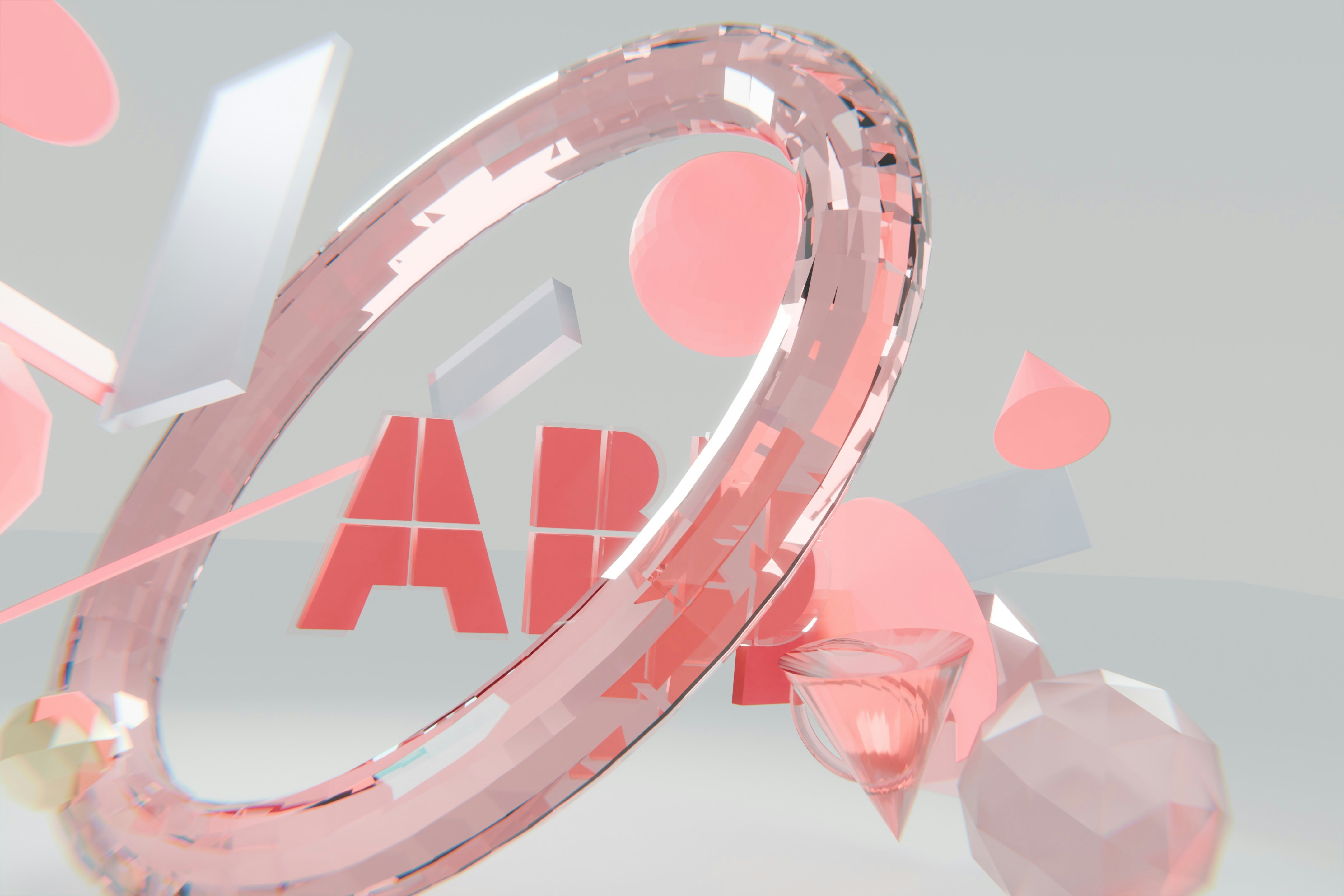 Faceted pink ring, 'app' text, and abstract geometric shapes.