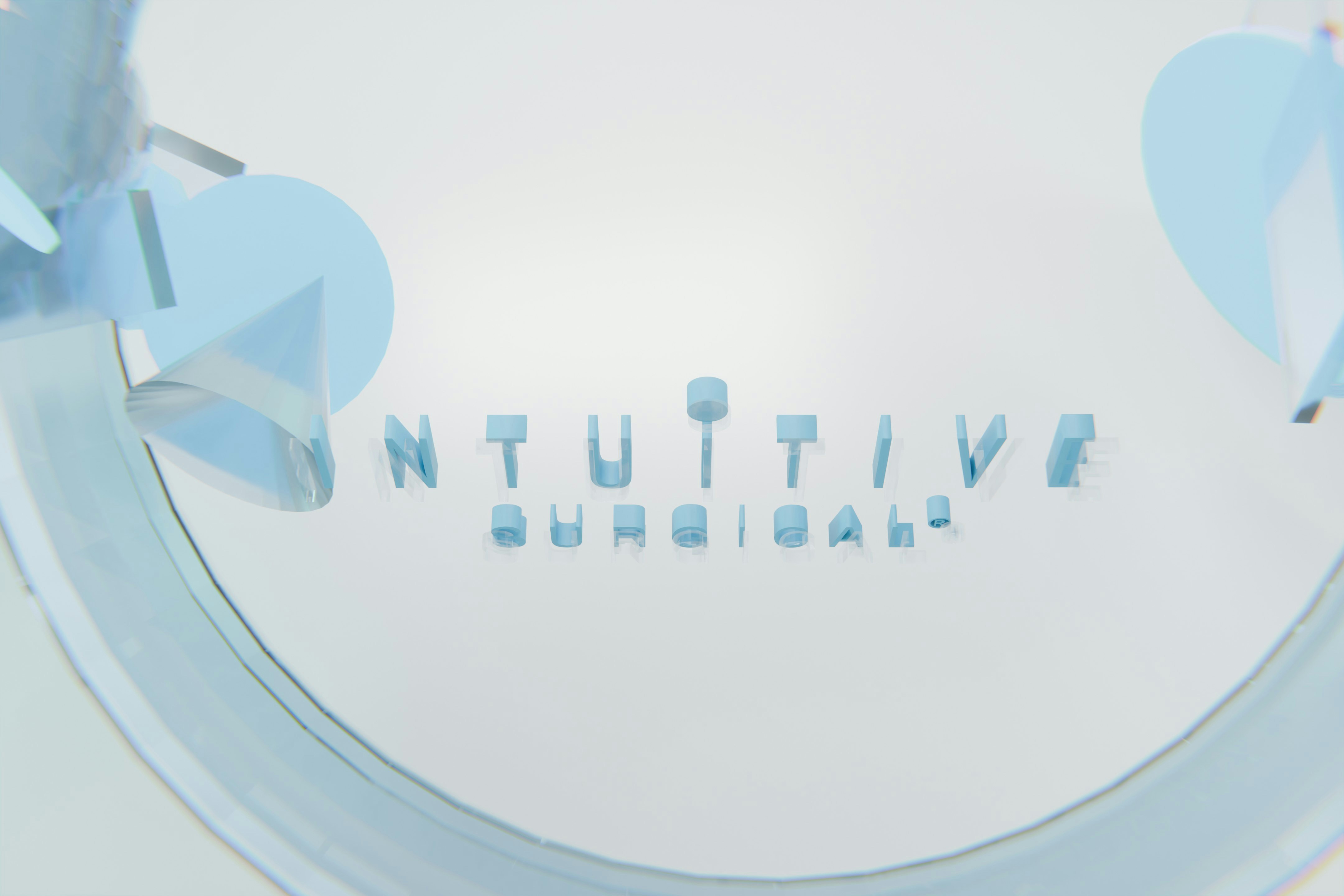 Light blue 3D text 'intuitive surgical' on a white background.