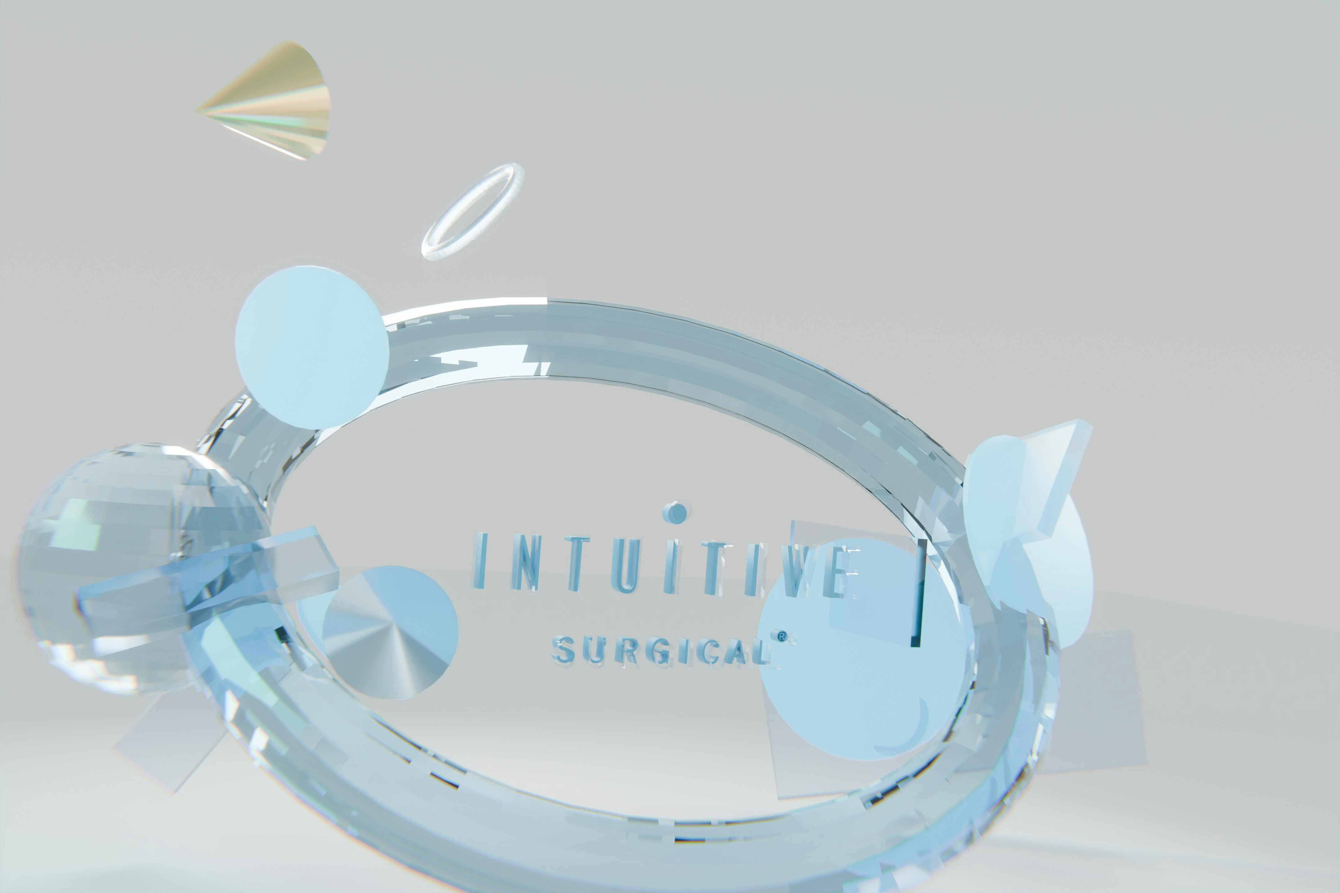 Intuitive surgical logo within a transparent blue abstract ring.