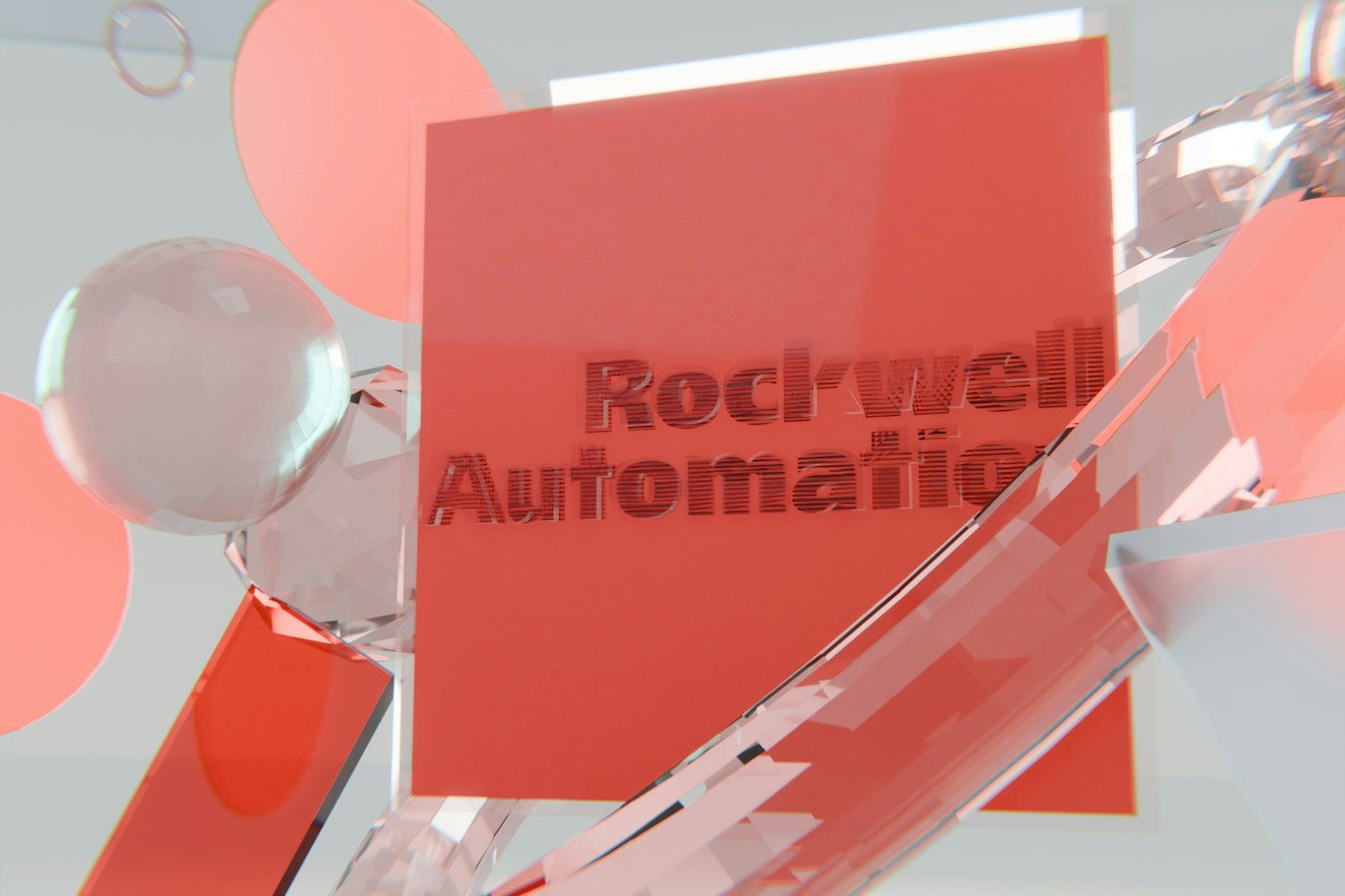 Rockwell automation logo on a red block with abstract shapes