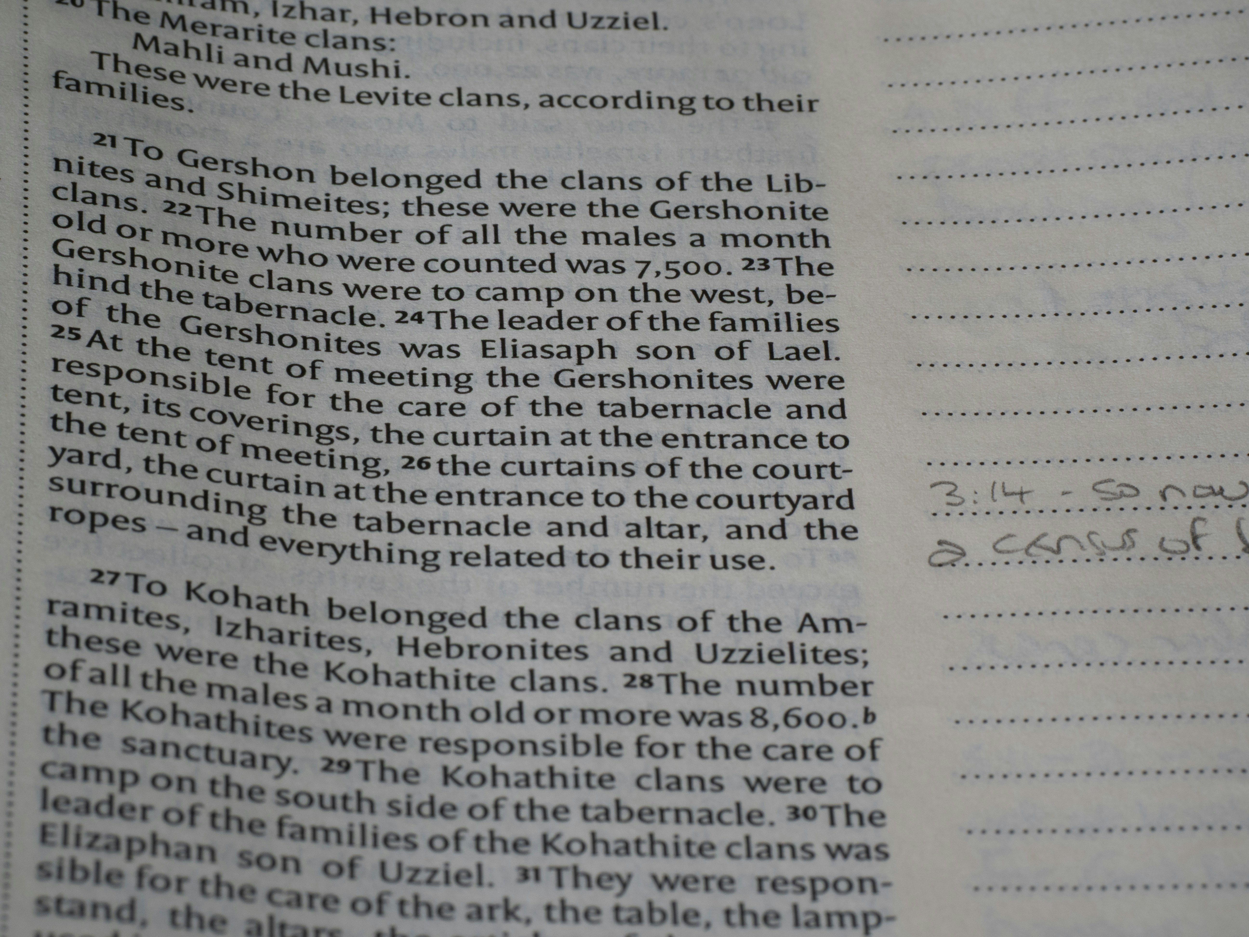 A book page with printed text and handwritten notes