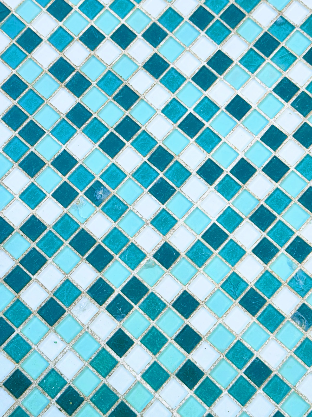 Peel-and-stick tiles updating a small rental bathroom