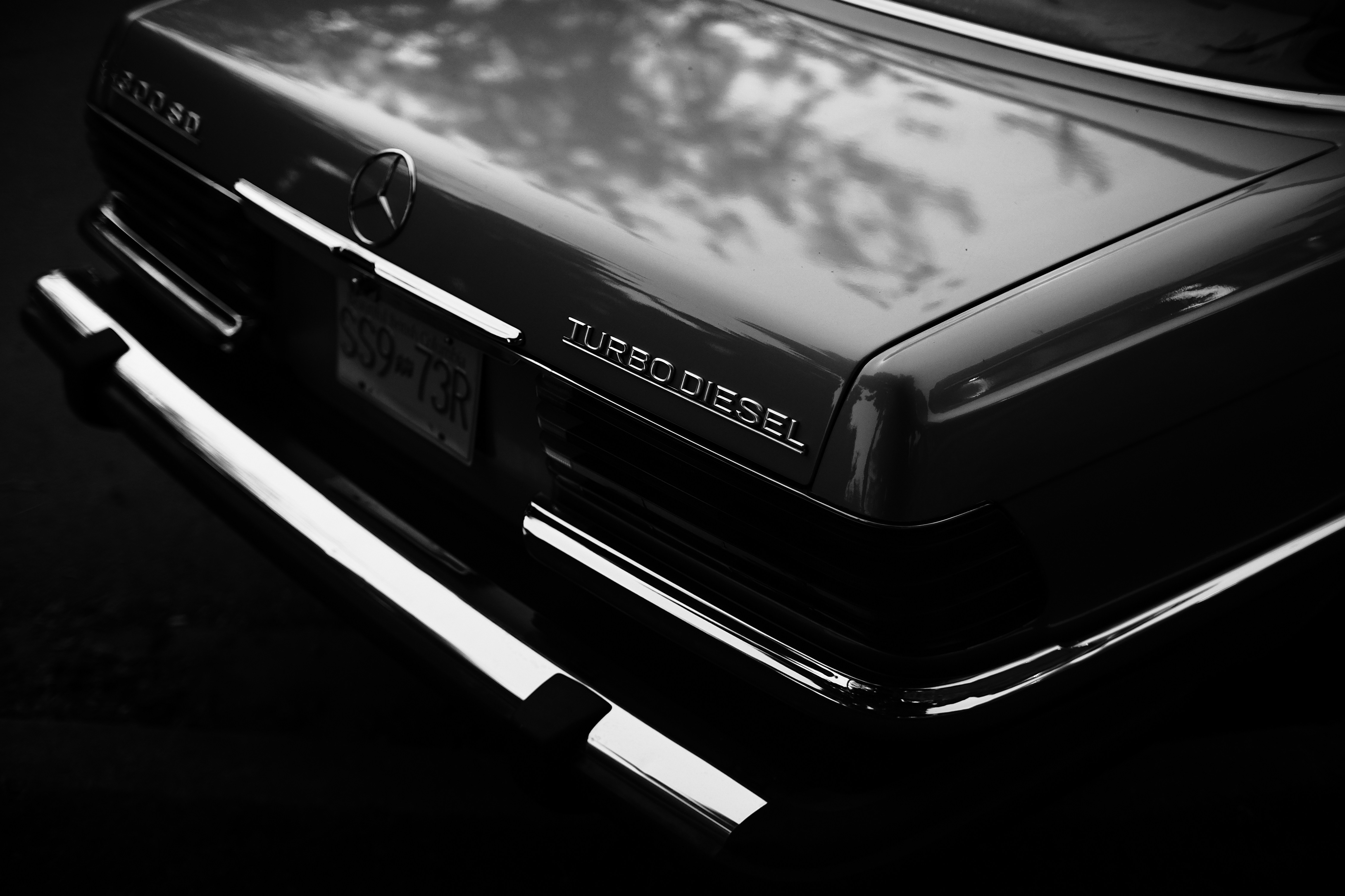 Cars Monochrome Rear Of A Turbo Diesel Car With Reflections. 4K Wallpaper #2194