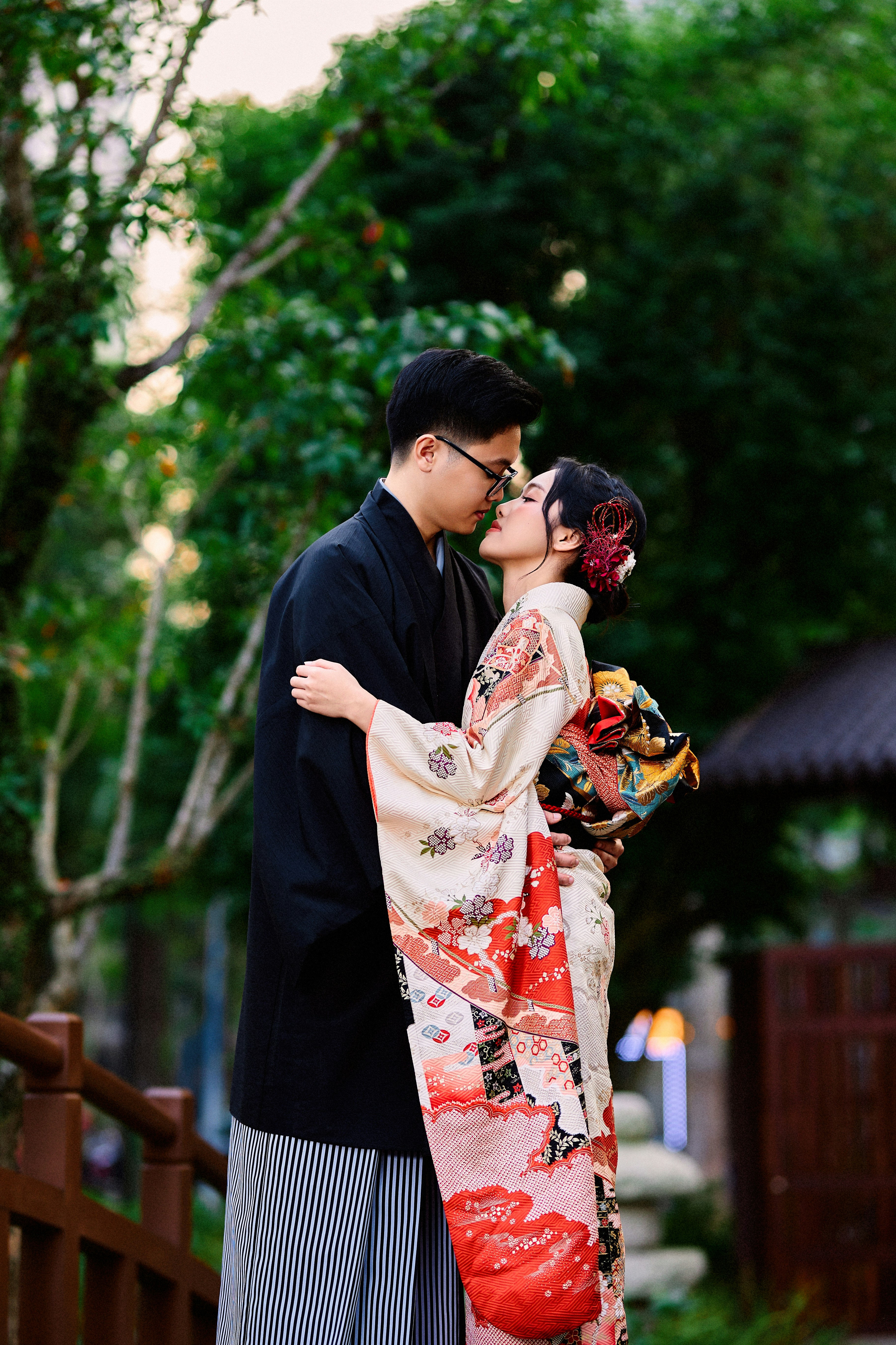 A joyful couple sharing a tender moment, smiling warmly at each other while taking a stroll outdoors. The image radiates genuine happiness, commitment, and the beautiful milestone of a long-lasting relationship.