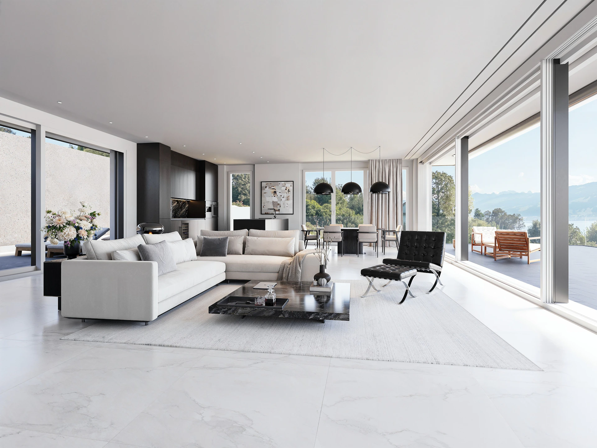 Elegant white living room overlooking a beautiful lake and mountains
