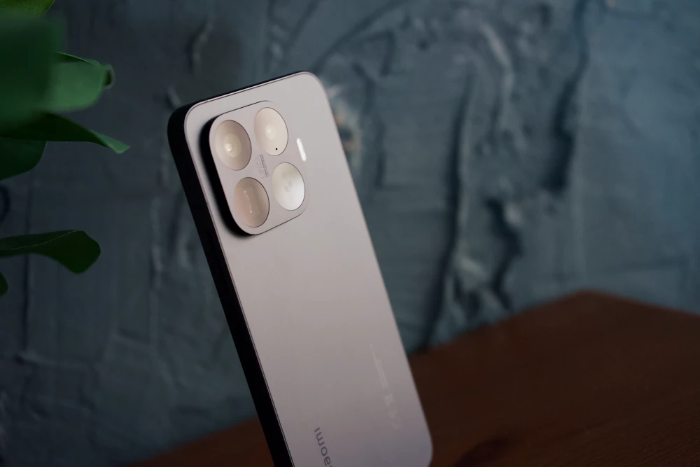 Rose-gold smartphone with quad camera module