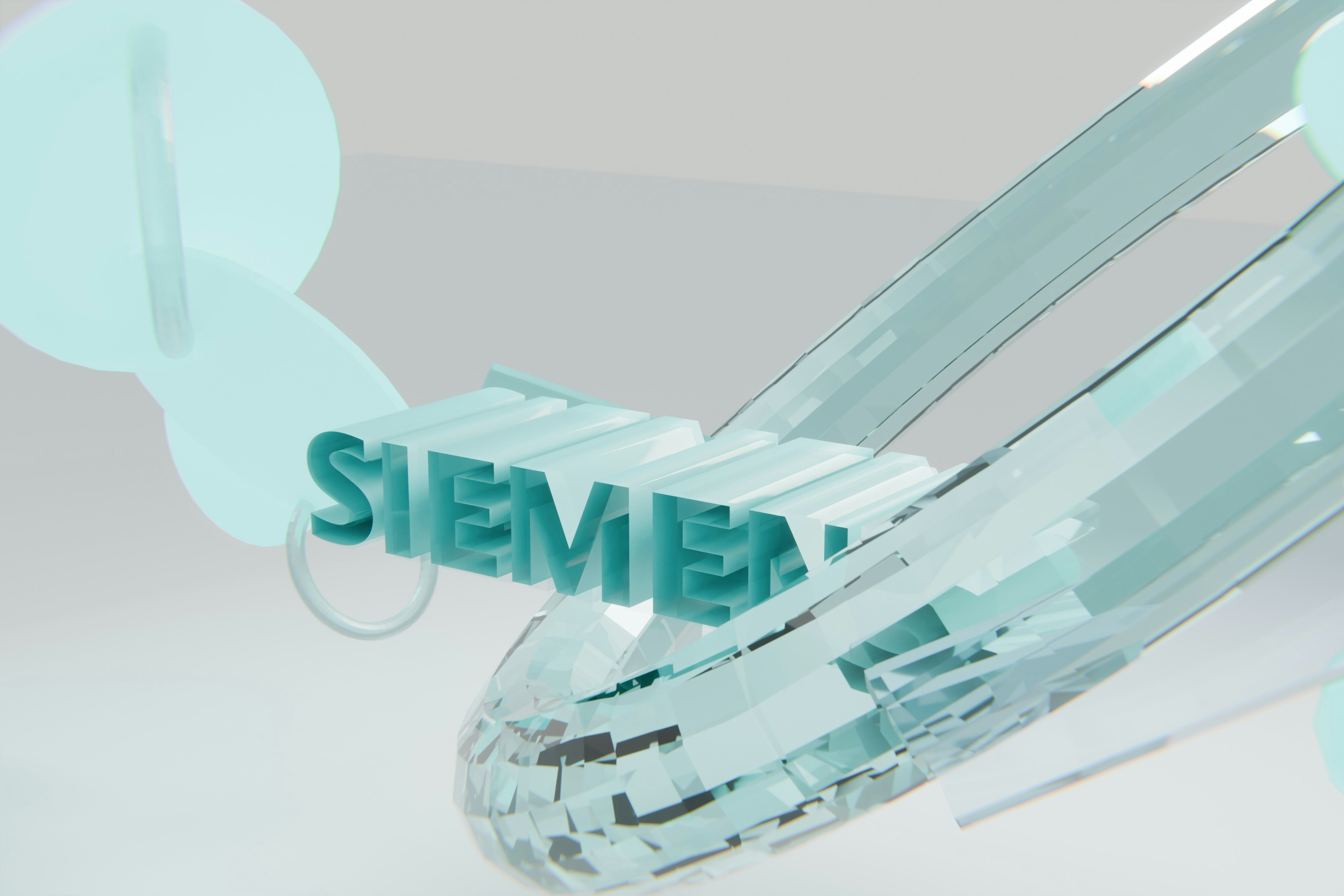 3D siemens logo with abstract blue and clear shapes.